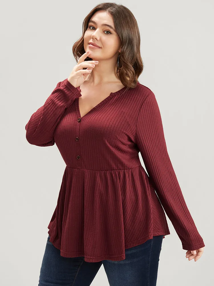 Solid Button Detail Rib Knit Asymmetrical Hem Long Tee sold by Bloomchic