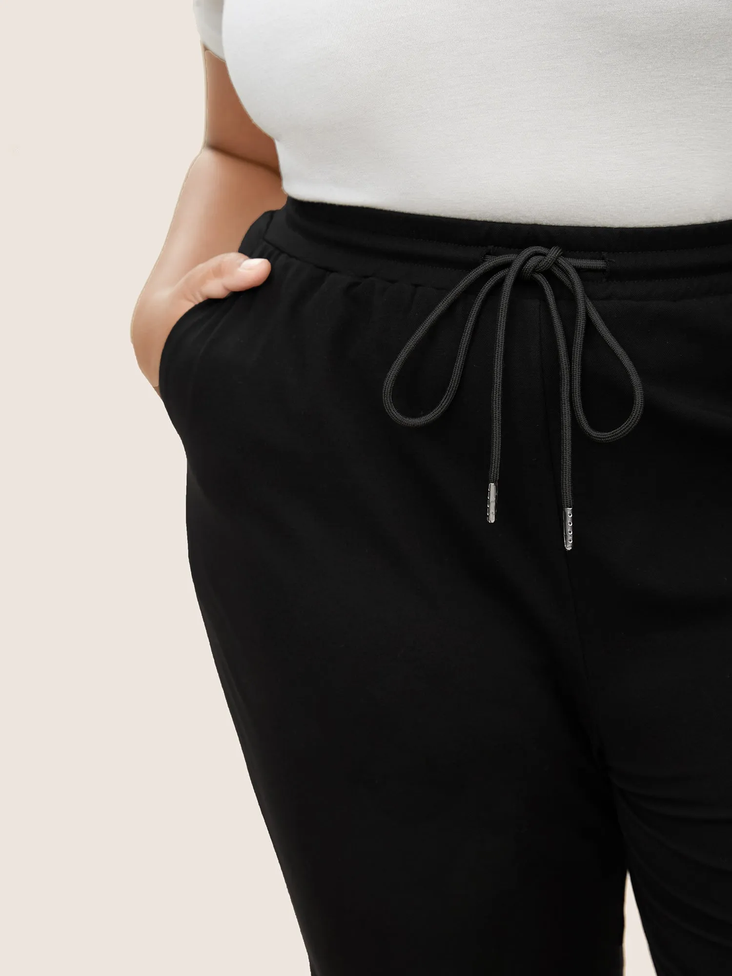 Plain Drawstring Waist Tapered Pants sold by Bloomchic product image thumbnail 4