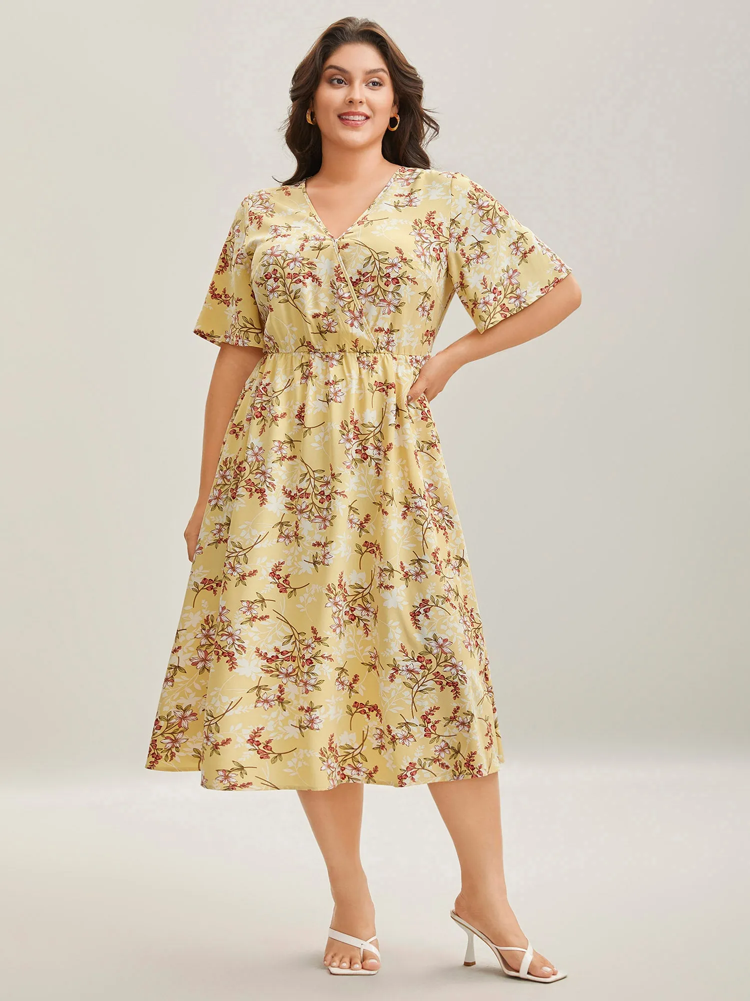 Large Flower Print Pockets Surplice Midi Dress sold by Bloomchic