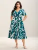 Large Flower Print Shirred Waist Midi Dress sold by Bloomchic