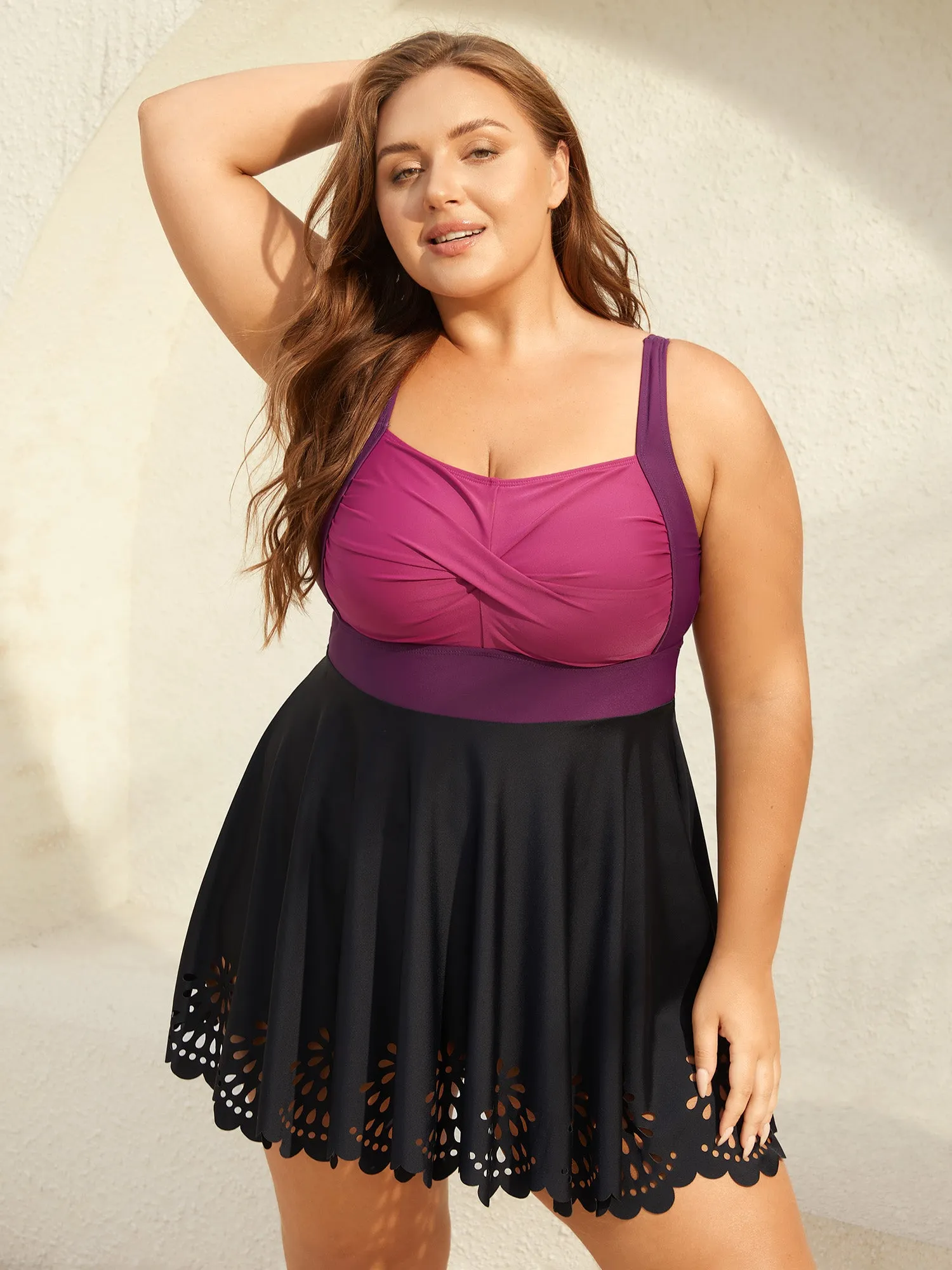 Twist Front Laser Cut Swim Dress sold by Bloomchic