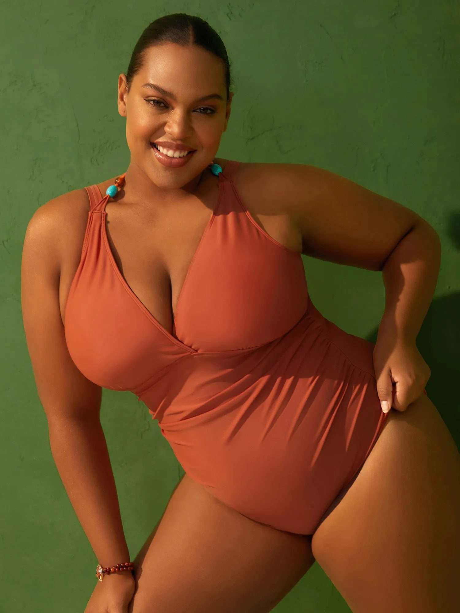 Ruched Plunging Neck One-Piece Swimsuit sold by Bloomchic