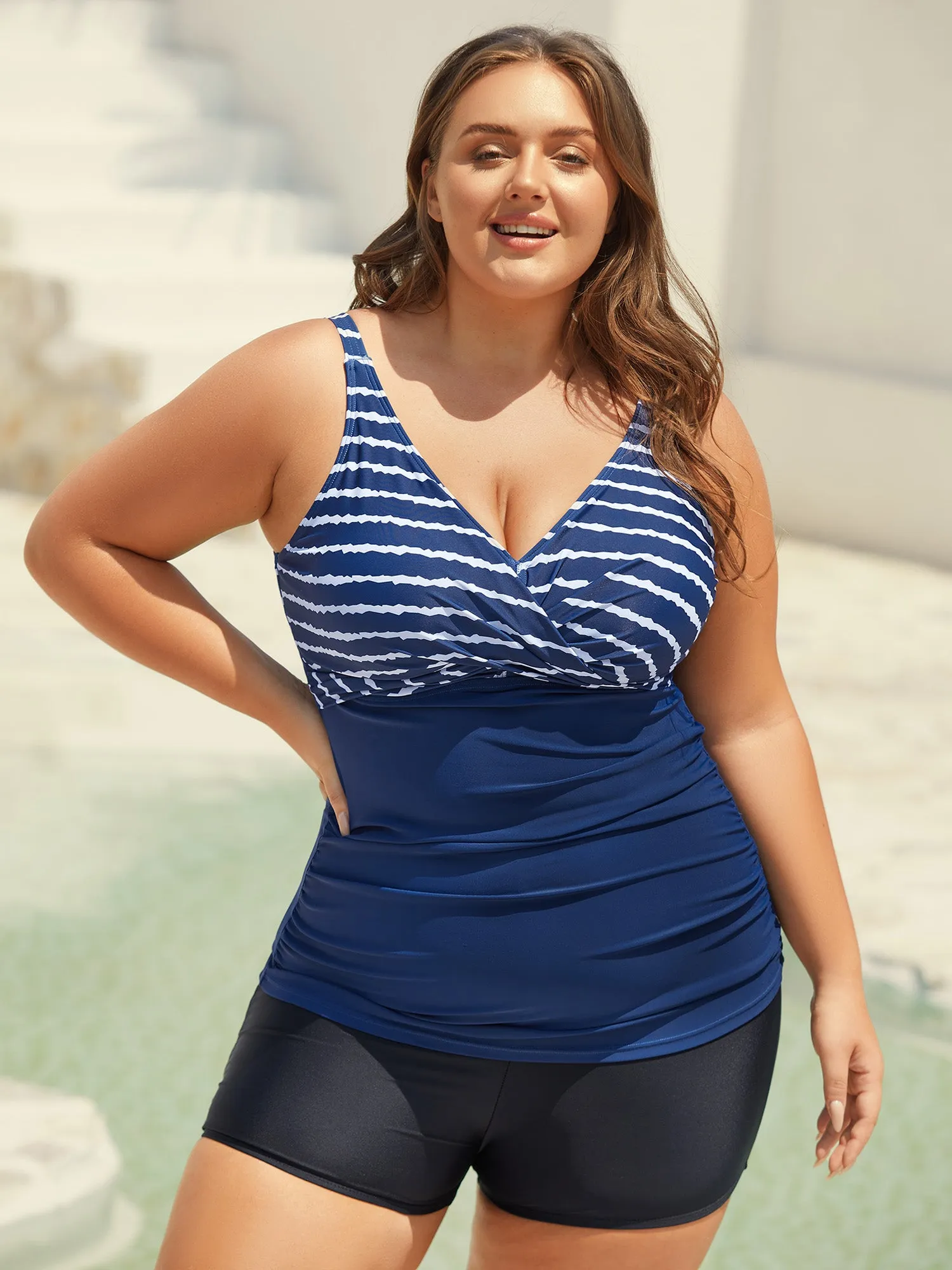 Stripes Spliced Ruched Swim Top sold by Bloomchic