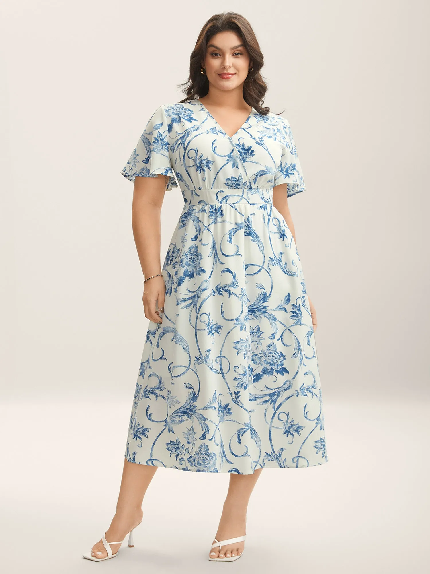 Artistic Floral Pattern Surplice Neck Midi Dress sold by Bloomchic