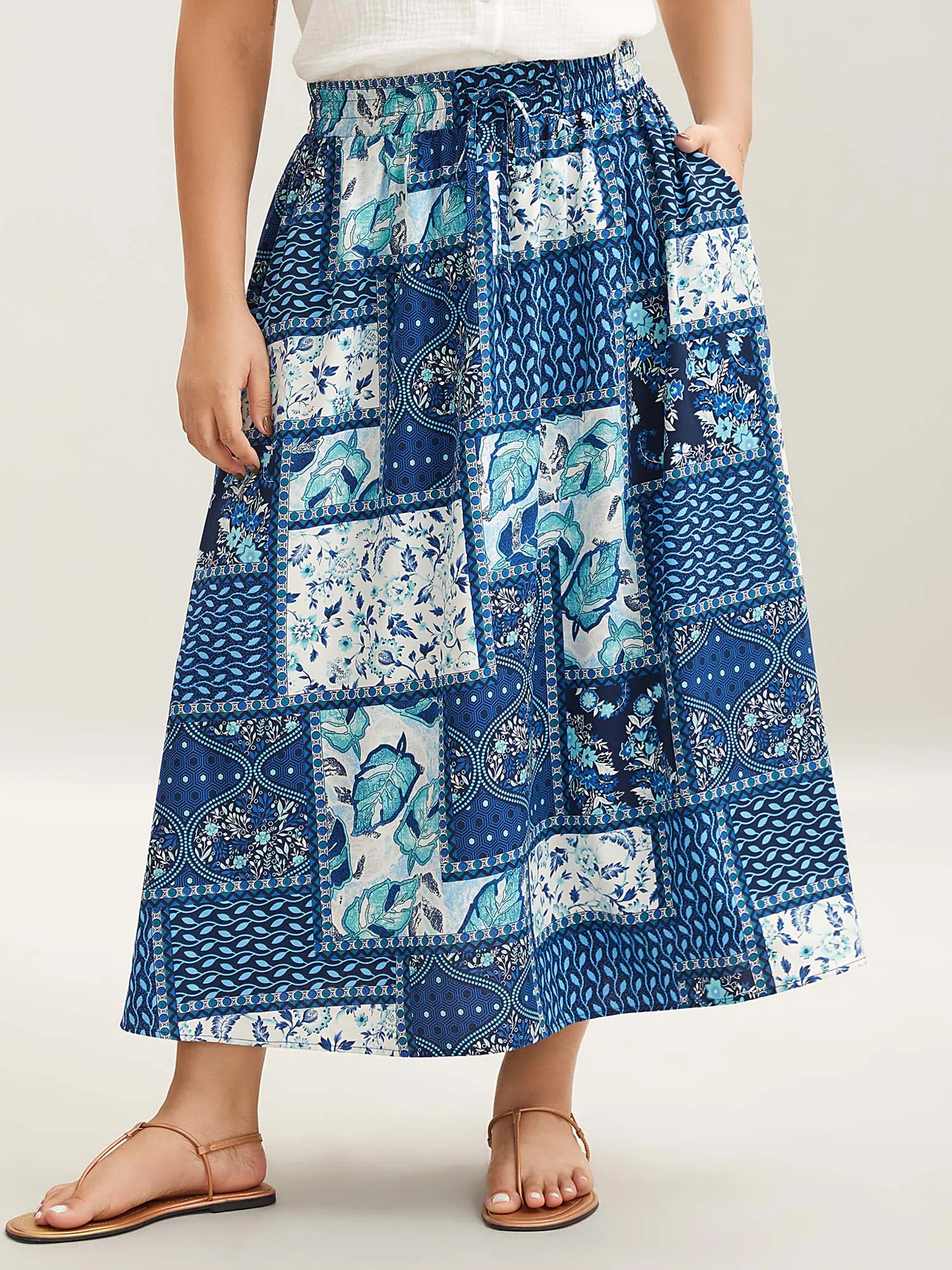 Collage Floral Print Flared Maxi Skirt sold by Bloomchic