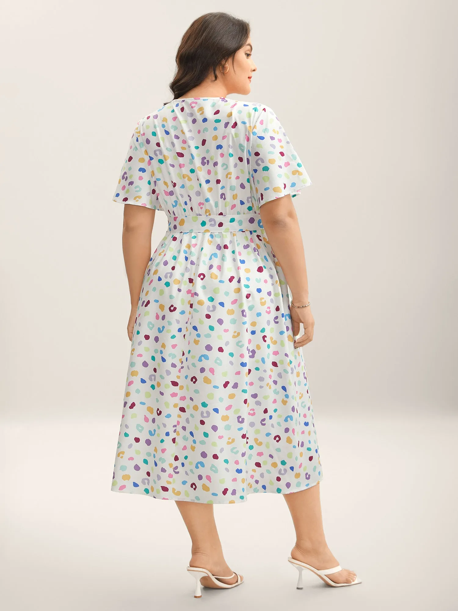 Multi-Color Leopard Print Surplice Midi Dress sold by Bloomchic product image thumbnail 4