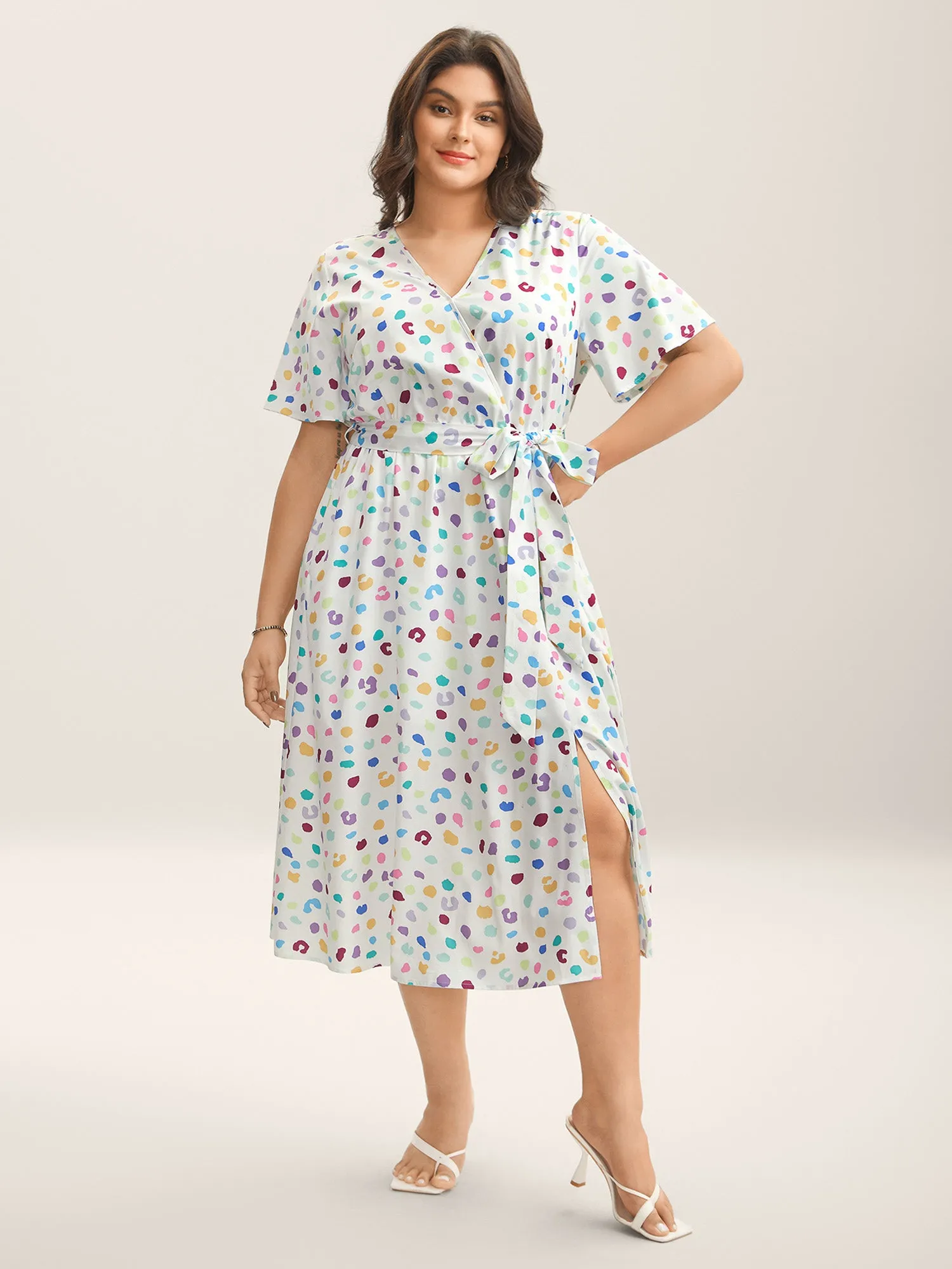 Multi-Color Leopard Print Surplice Midi Dress sold by Bloomchic