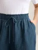 Curved Hem Straight-Leg Shorts sold by Bloomchic