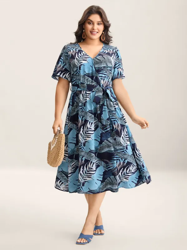 Tropical Leaf Print Pockets Belted Midi Dress sold by Bloomchic