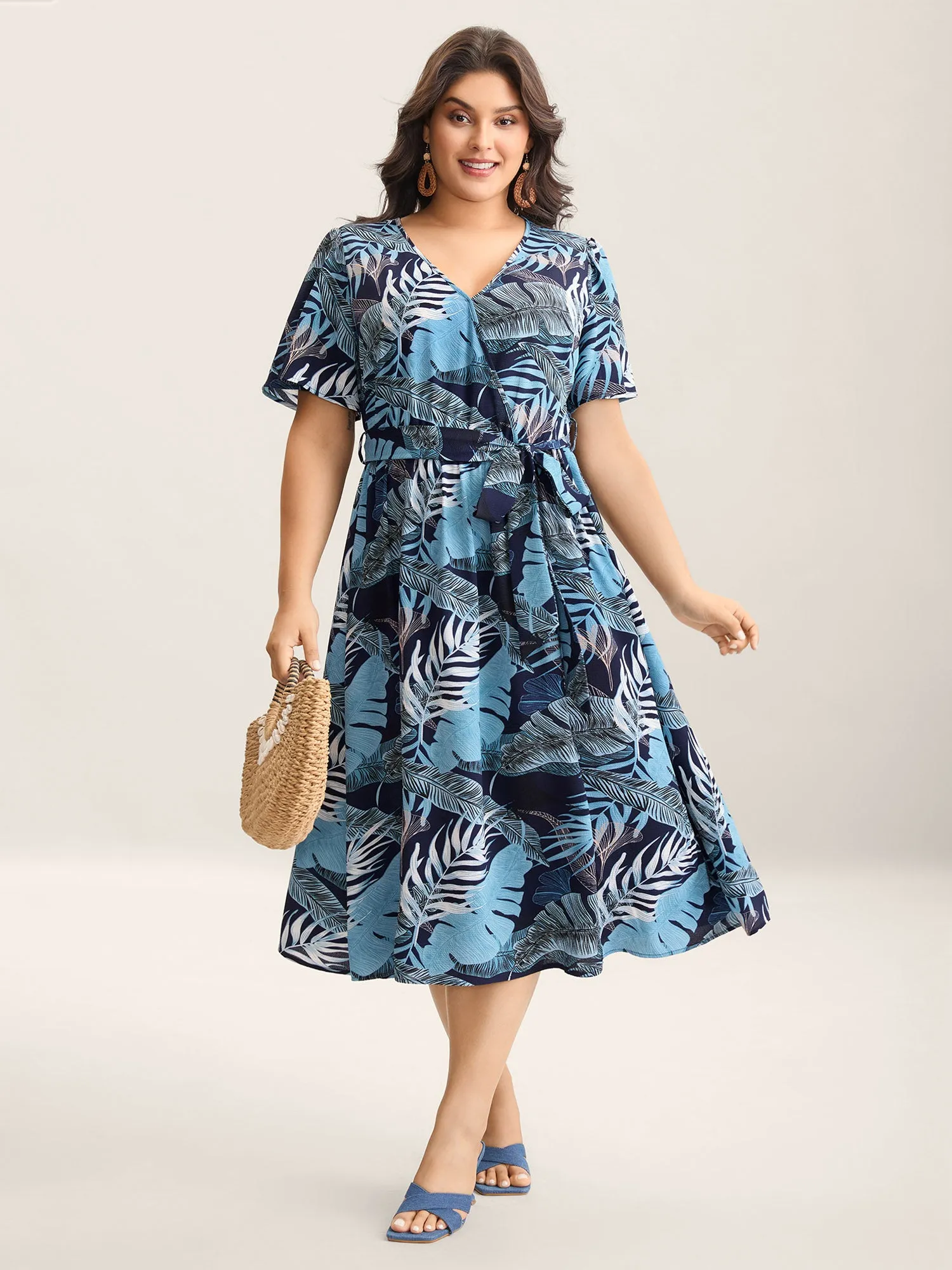 Tropical Leaf Print Pockets Belted Midi Dress sold by Bloomchic