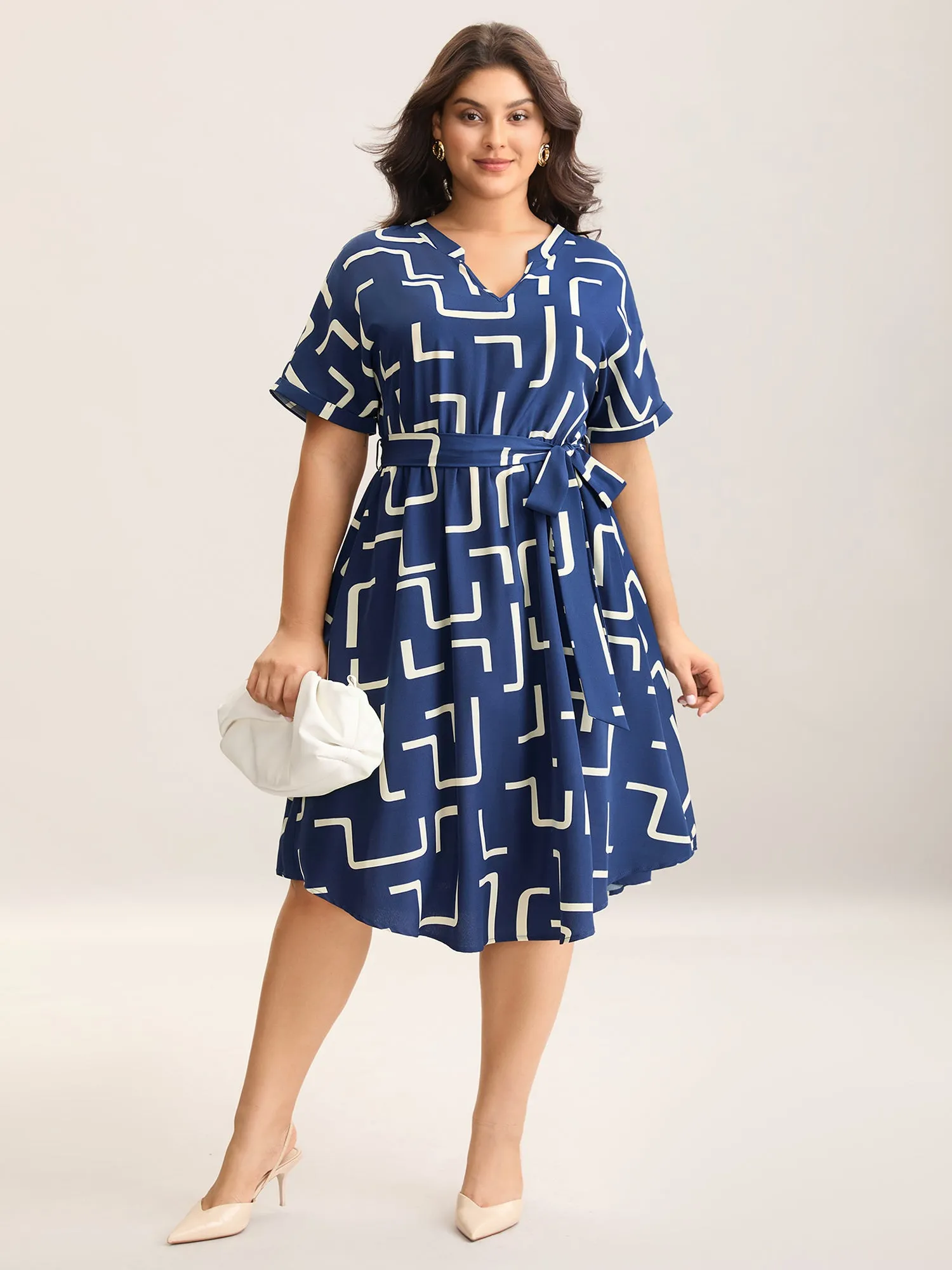 Geometric Print Curved Hem Midi Dress sold by Bloomchic