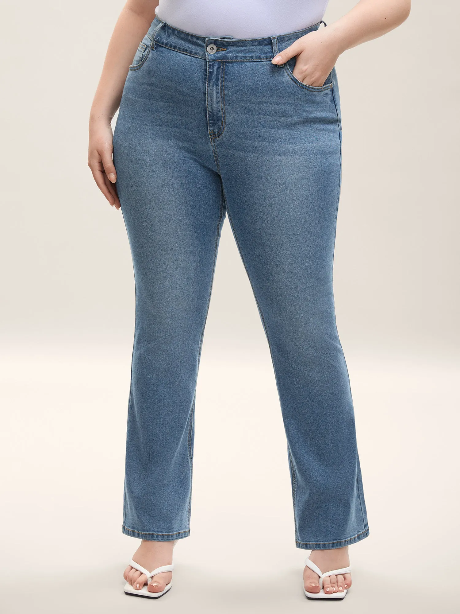 Classic Bootcut Mid-Rise Jeans sold by Bloomchic