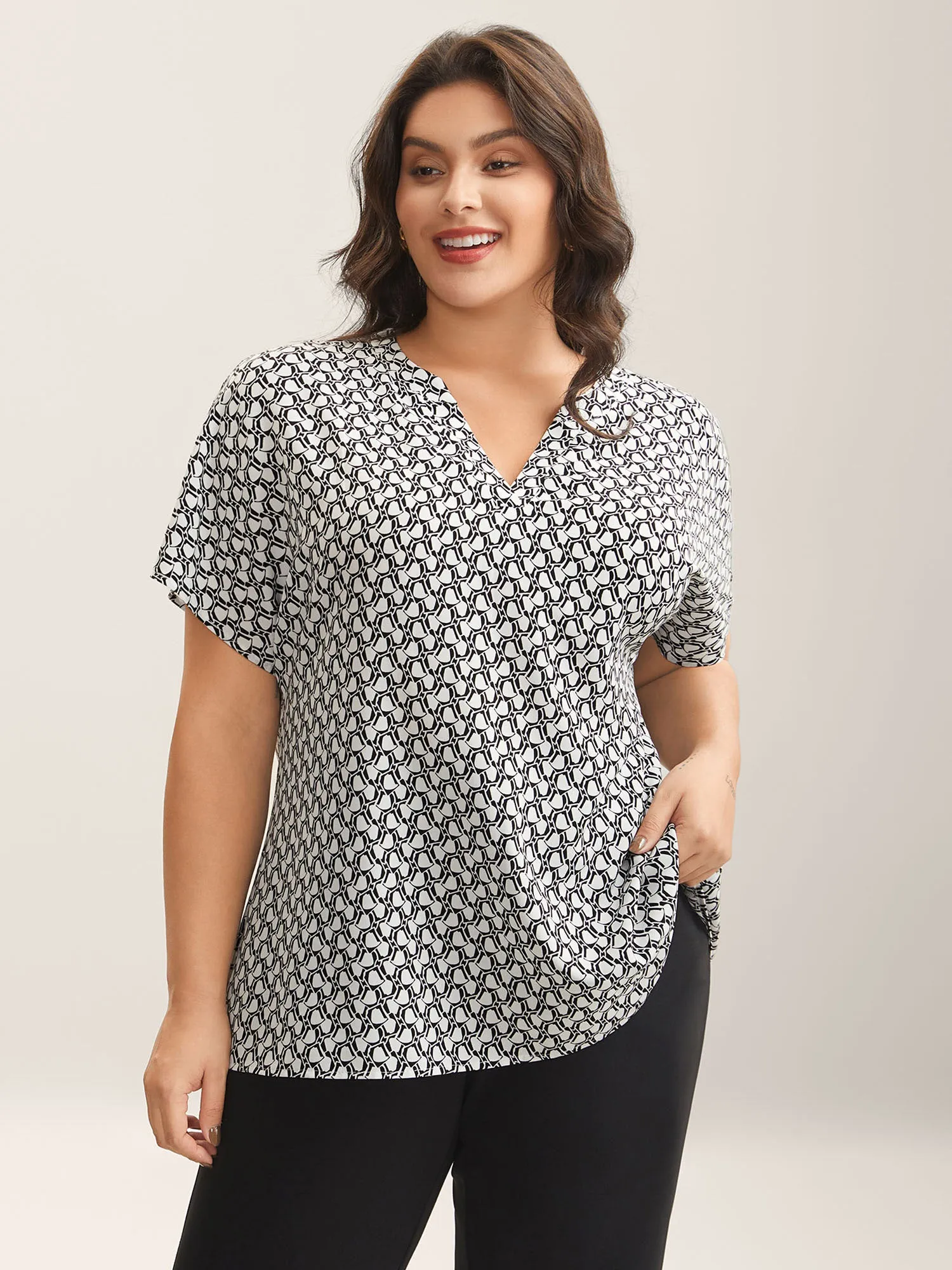 Geometric Print Notched Collar Blouse sold by Bloomchic