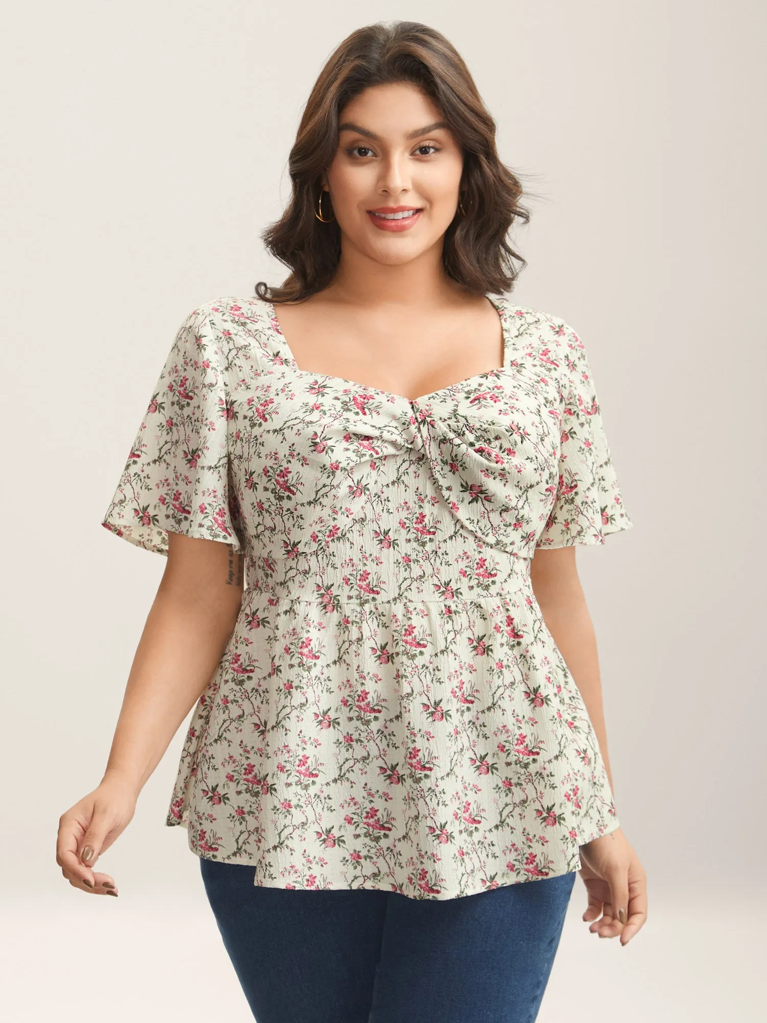 Knotted Floral Print Flared Sleeve Blouse sold by Bloomchic