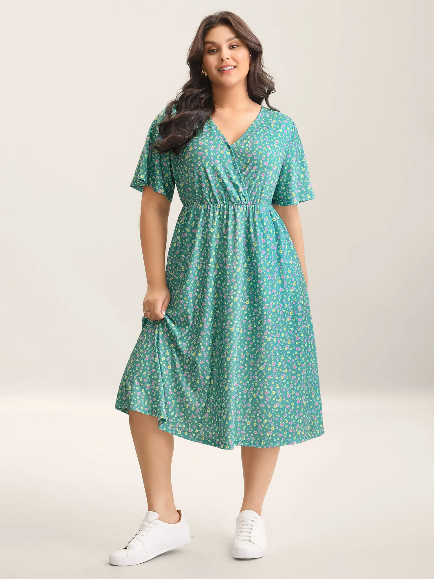 Floral Print Surplice Neck Midi Dress sold by Bloomchic