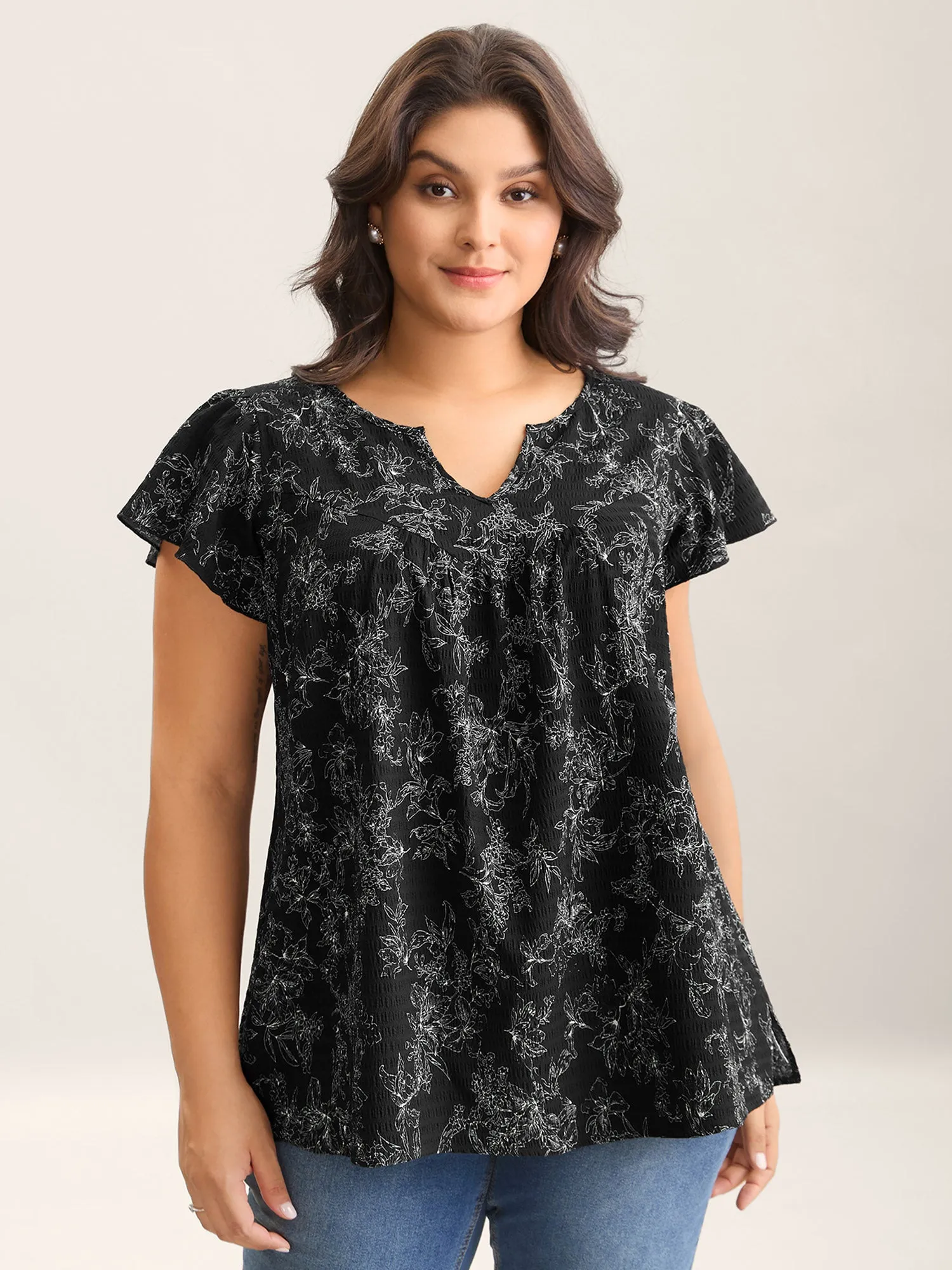 Silhouette Floral Print Flutter Sleeve Blouse sold by Bloomchic