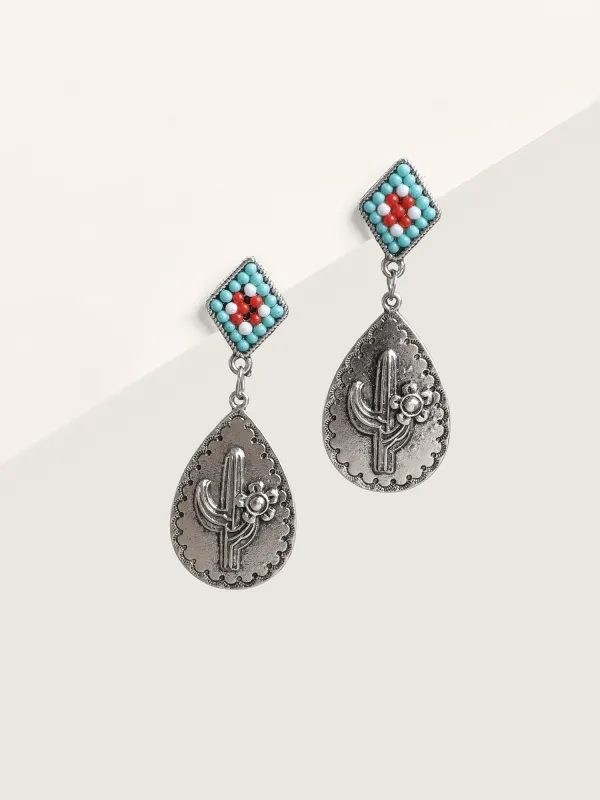Antique Silver Turquoise Drop Earrings sold by Bloomchic