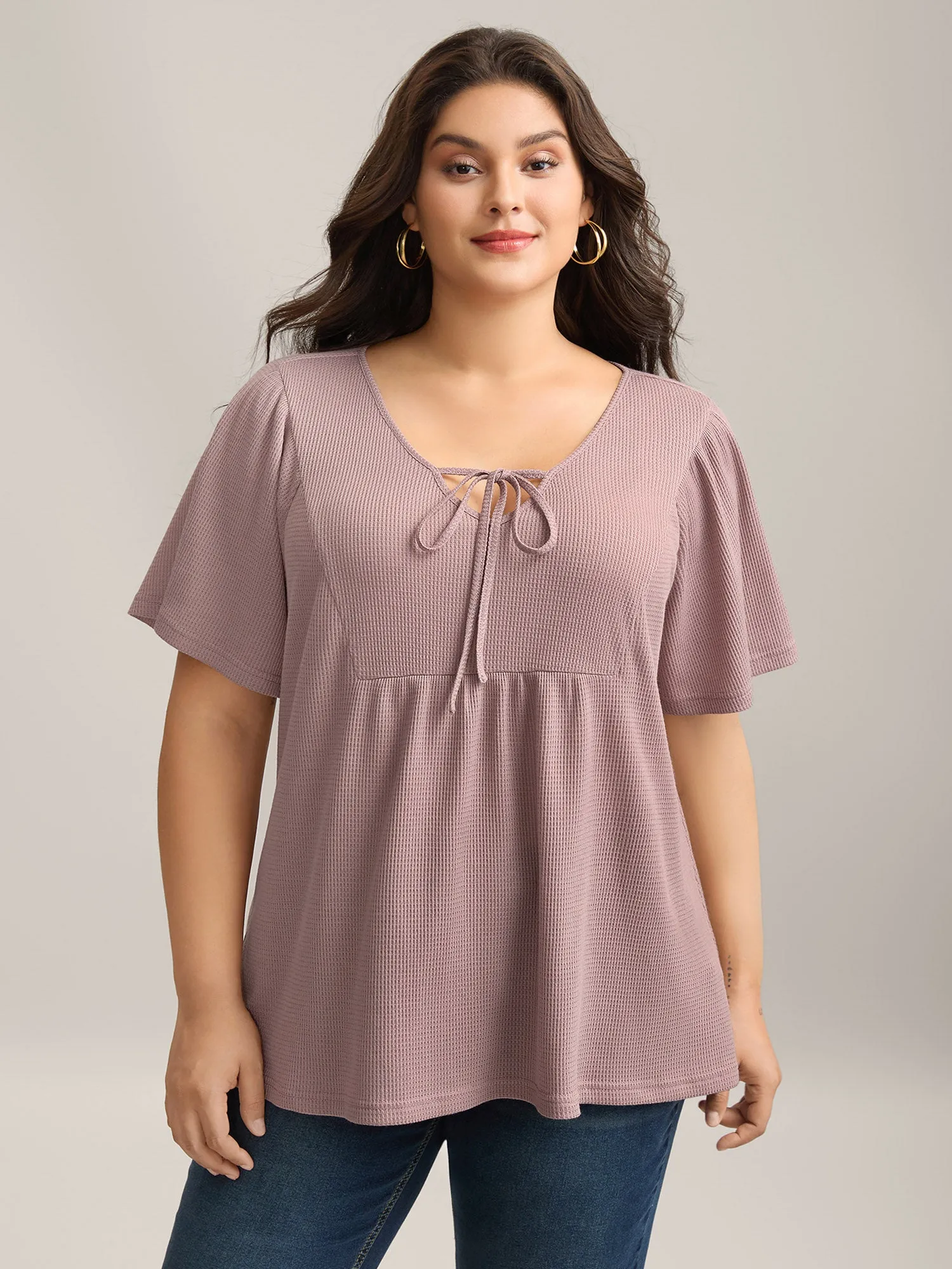 Waffle Neck-Tie Flowy Plain Knit Top sold by Bloomchic