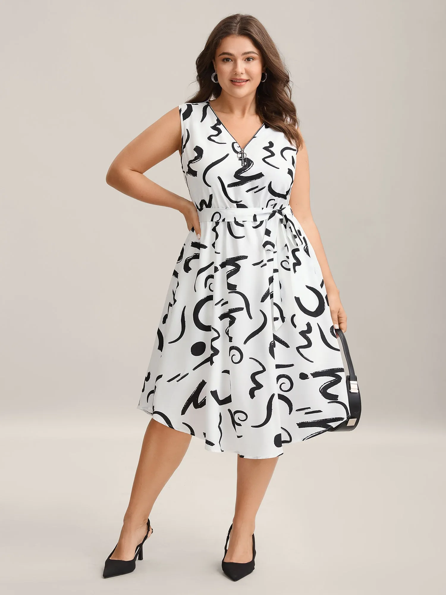 Scribble Print Belted Zipper Midi Dress sold by Bloomchic