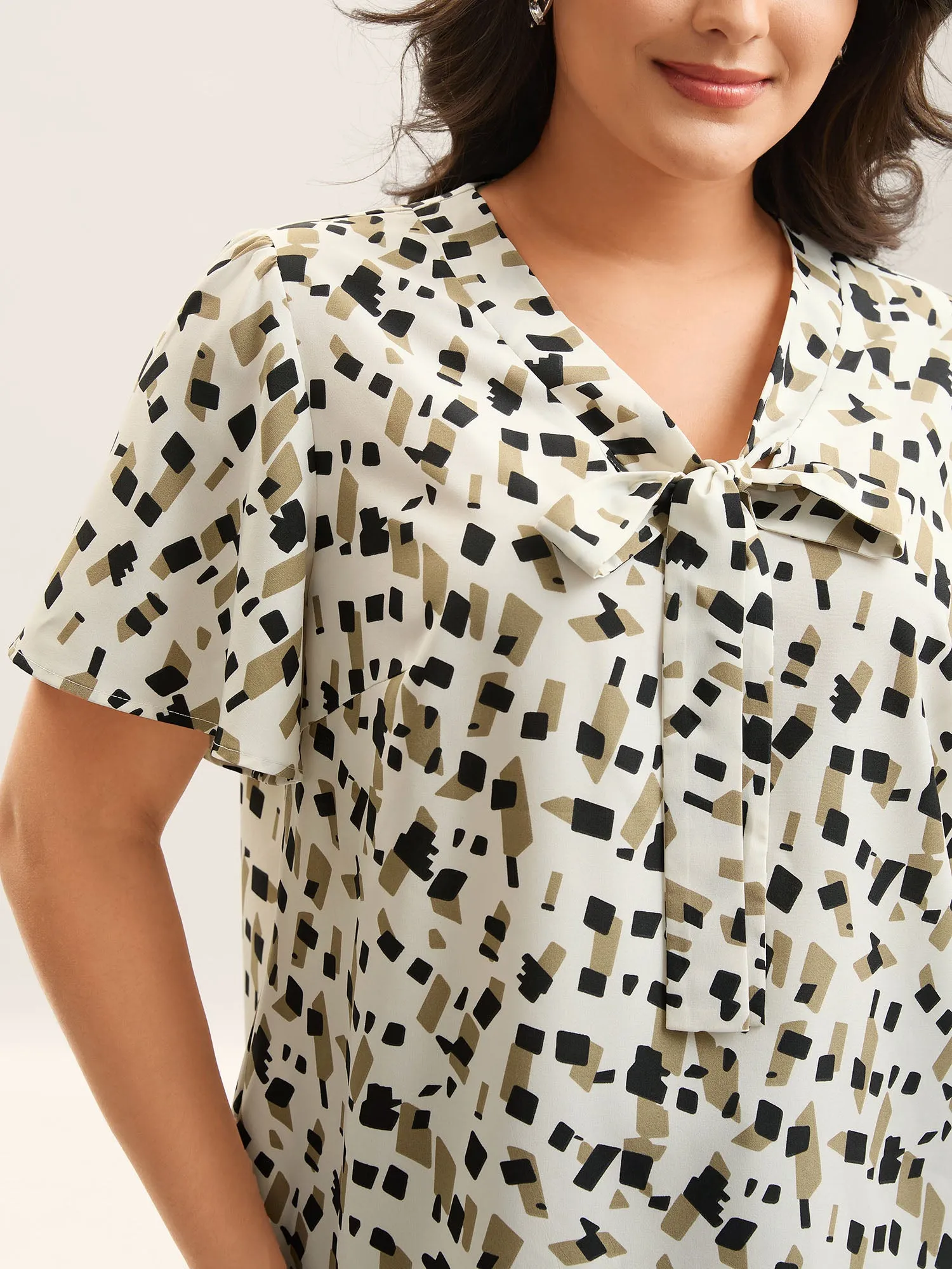 Geometric Print Ribbon Collar Blouse sold by Bloomchic product image thumbnail 2