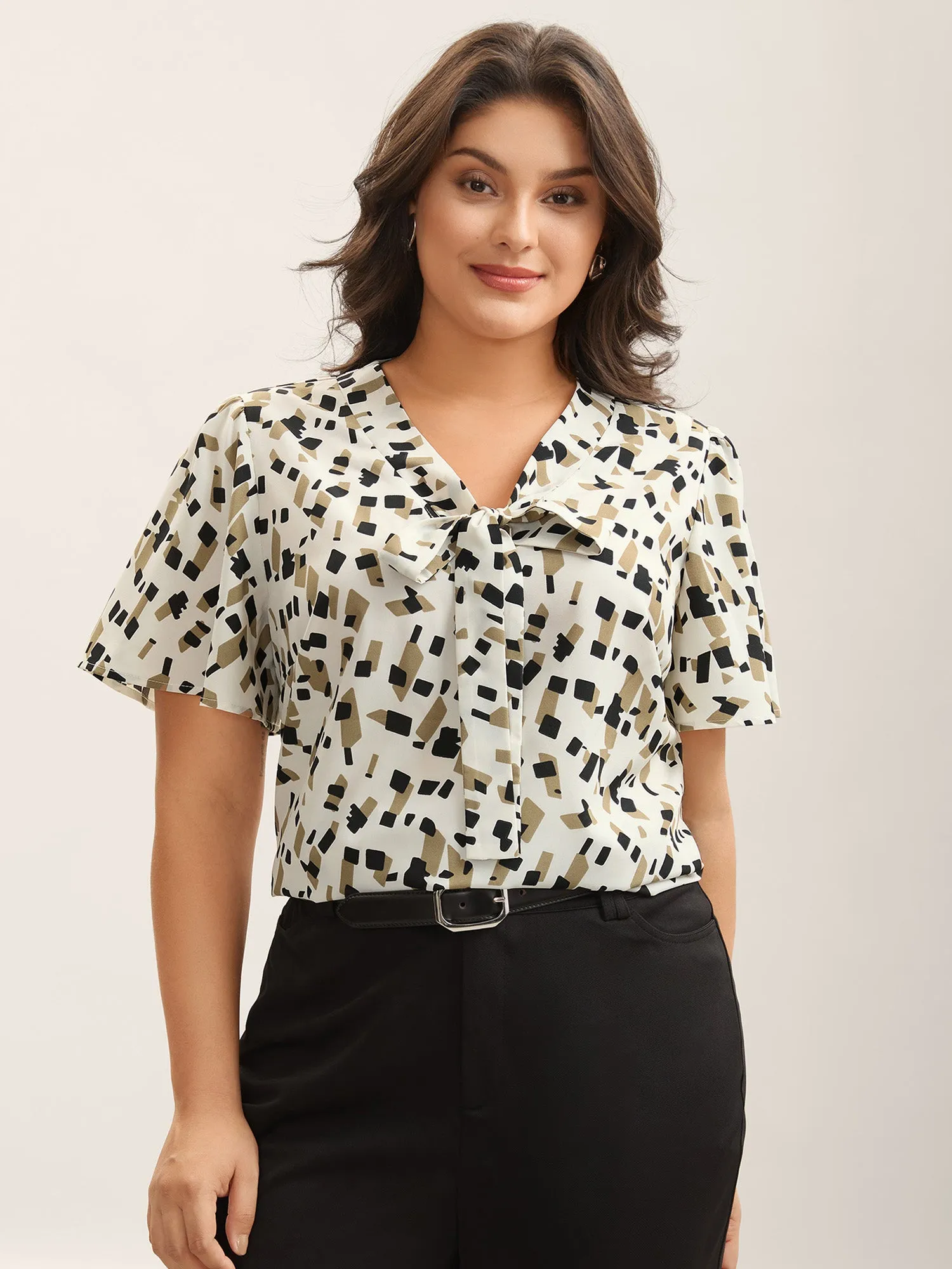 Geometric Print Ribbon Collar Blouse sold by Bloomchic