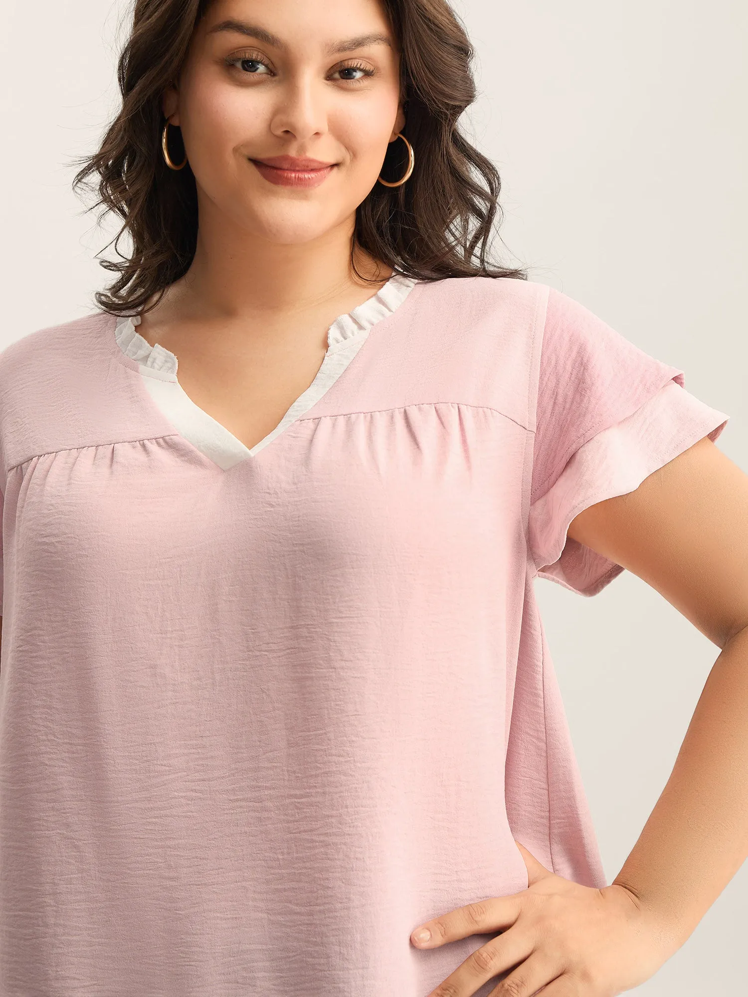 Color Contrast Ruffled Notched Collar Blouse sold by Bloomchic