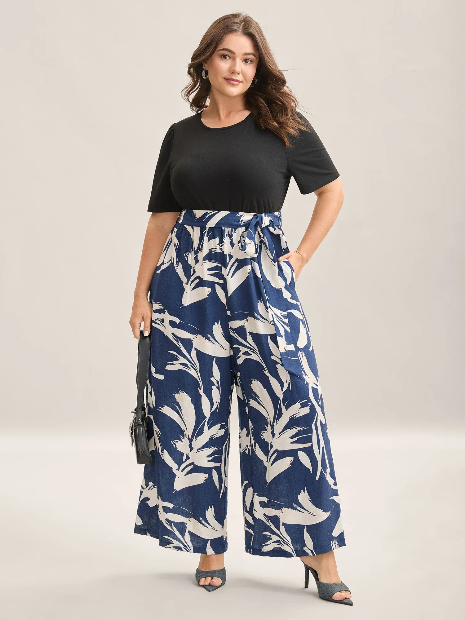 Feather Print Contrast Pockets Belted Jumpsuit sold by Bloomchic