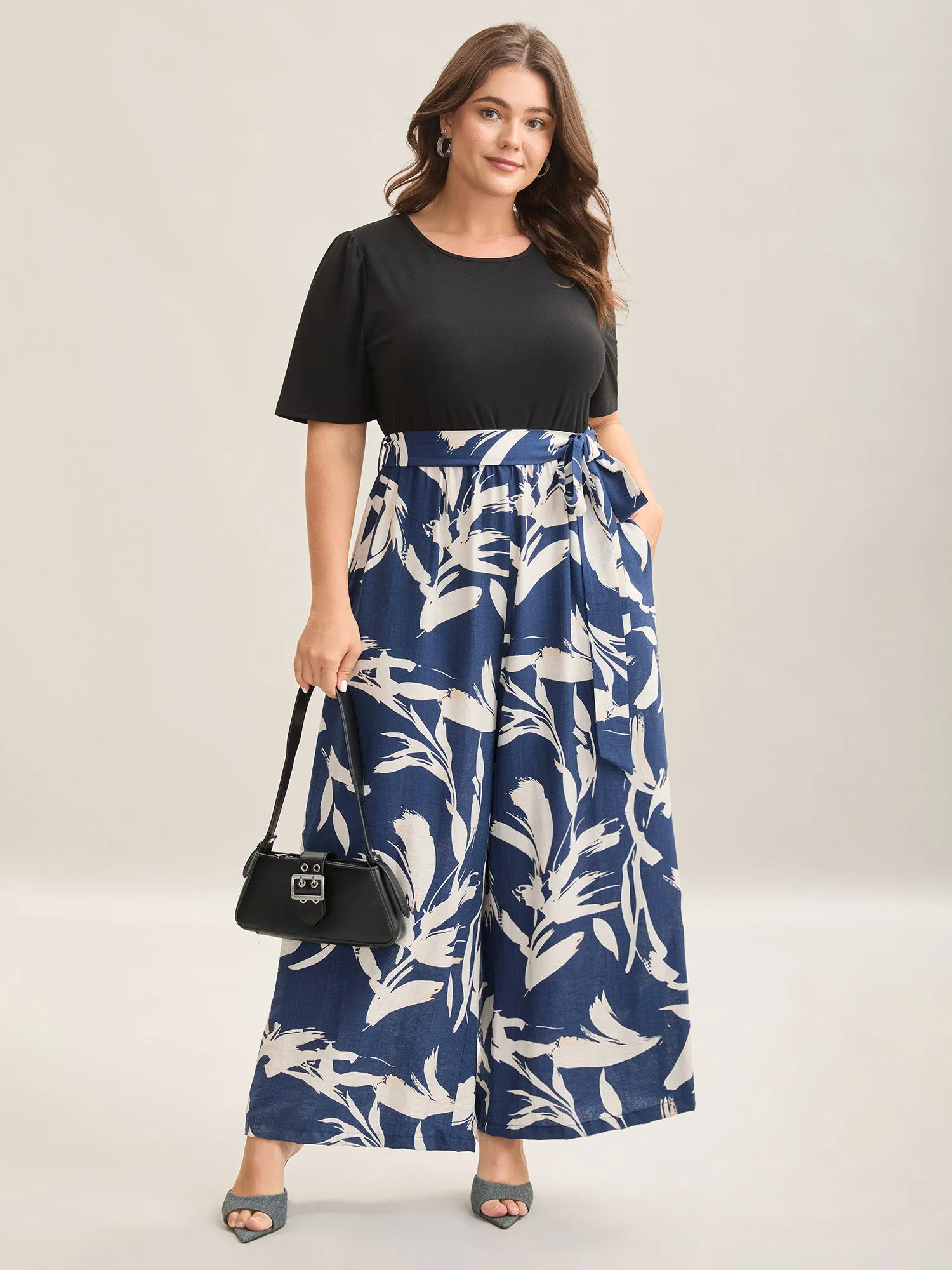 Feather Print Contrast Pockets Belted Jumpsuit sold by Bloomchic product image thumbnail 3