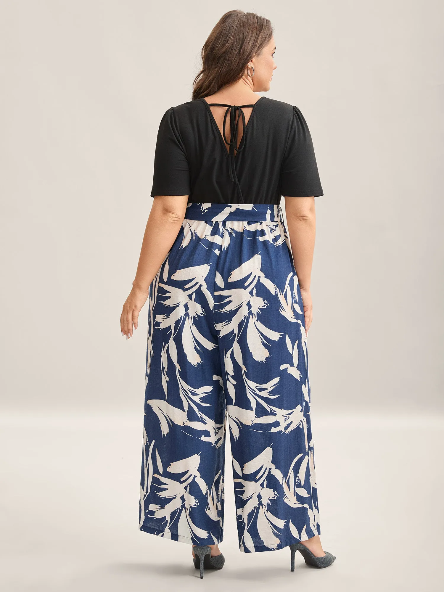 Feather Print Contrast Pockets Belted Jumpsuit sold by Bloomchic product image thumbnail 4