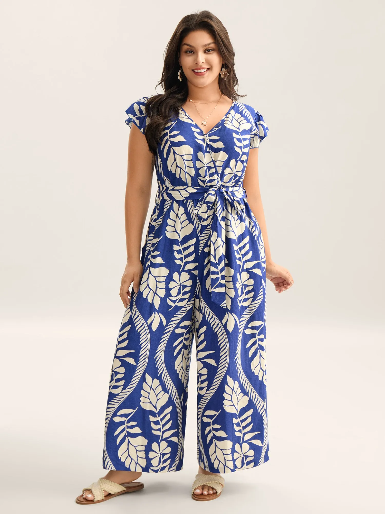Large Floral Print Pockets Jumpsuit sold by Bloomchic