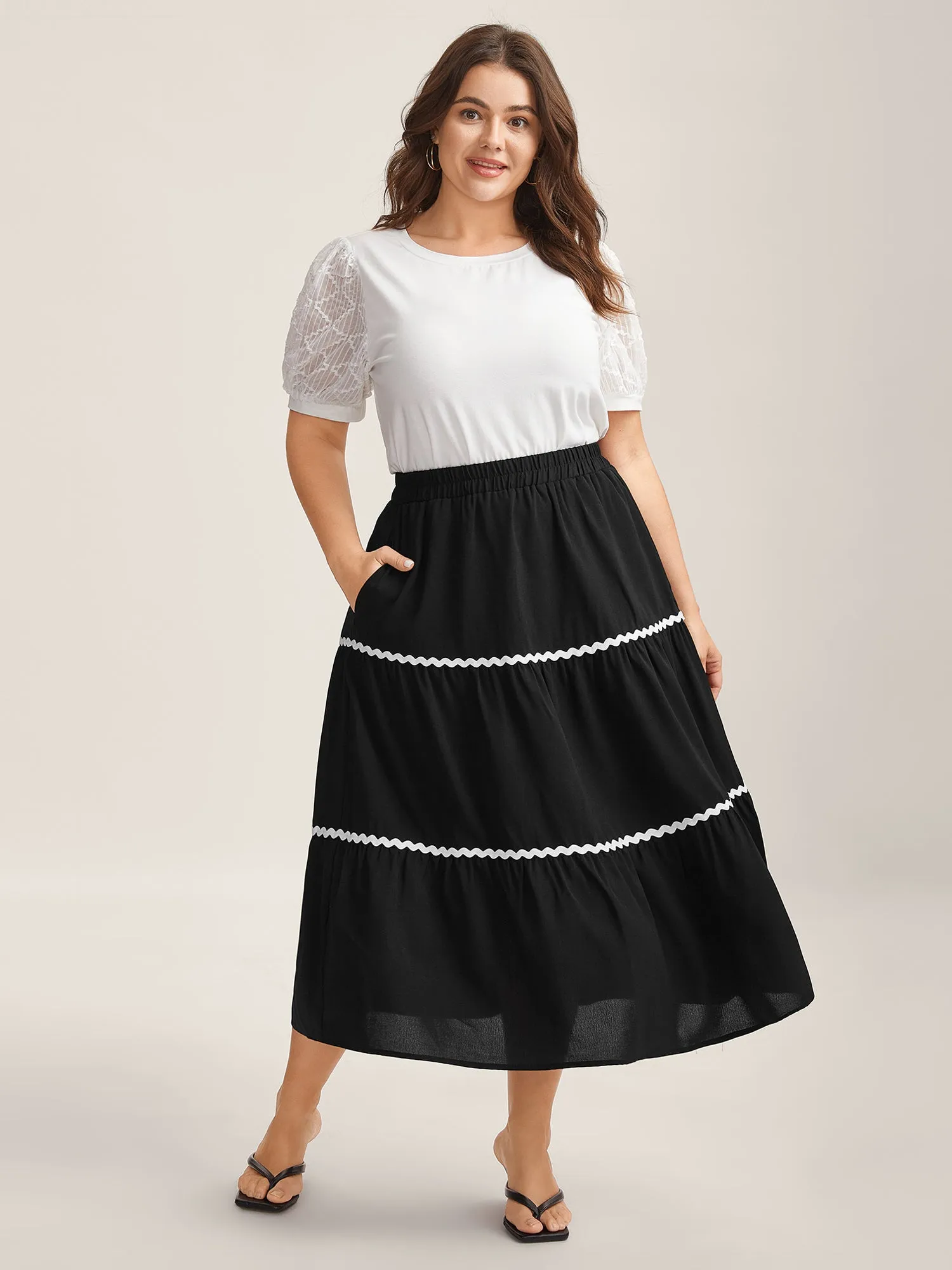 Wavy Lace Trim Tiered Maxi Skirt sold by Bloomchic
