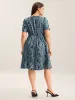 Leopard Print Faux Wrap Ruffled Midi Dress sold by Bloomchic