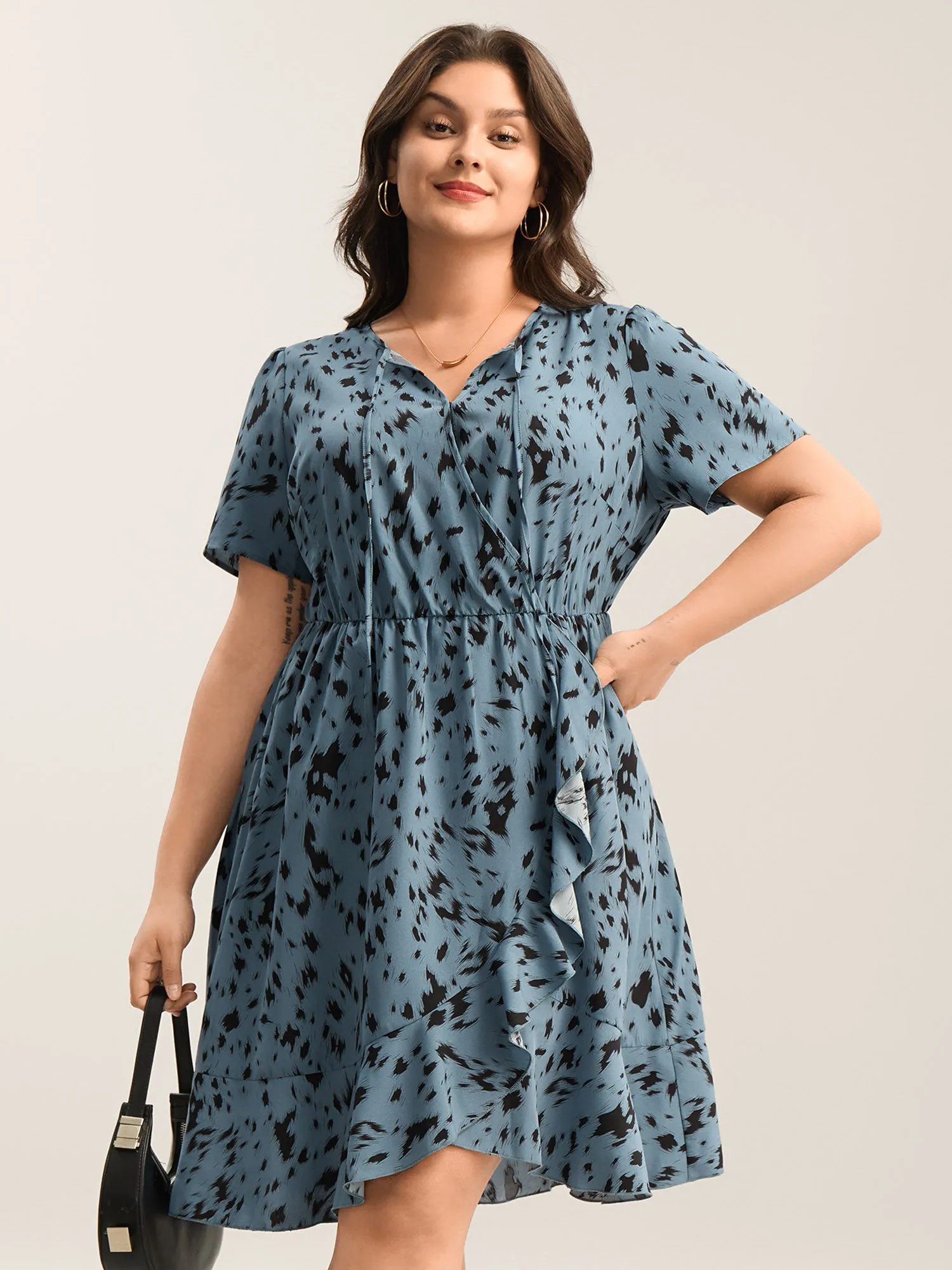 Leopard Print Faux Wrap Ruffled Midi Dress sold by Bloomchic