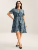 Leopard Print Faux Wrap Ruffled Midi Dress sold by Bloomchic