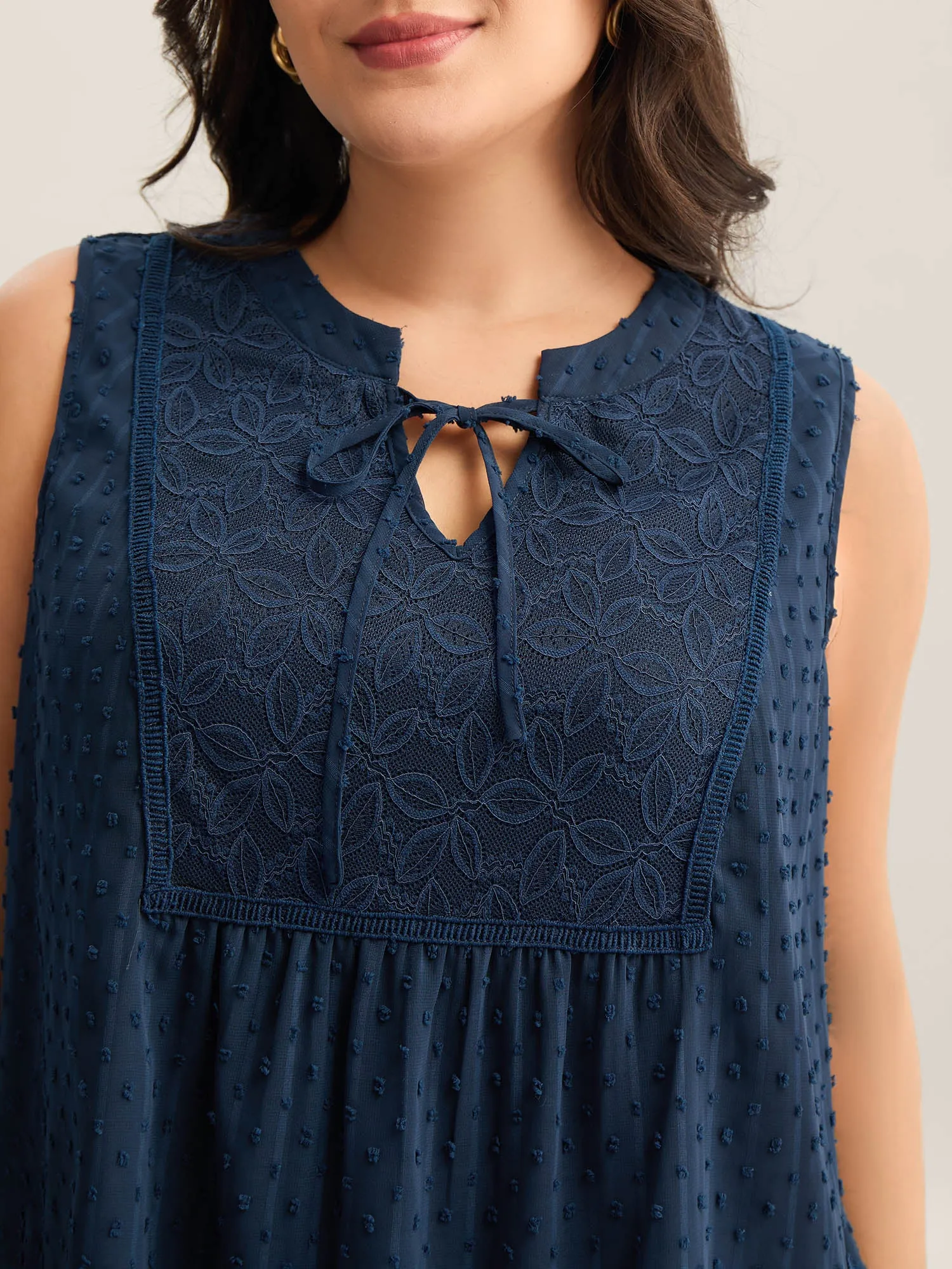 Textured Lace Detail Neck Tie Sleeveless Top sold by Bloomchic