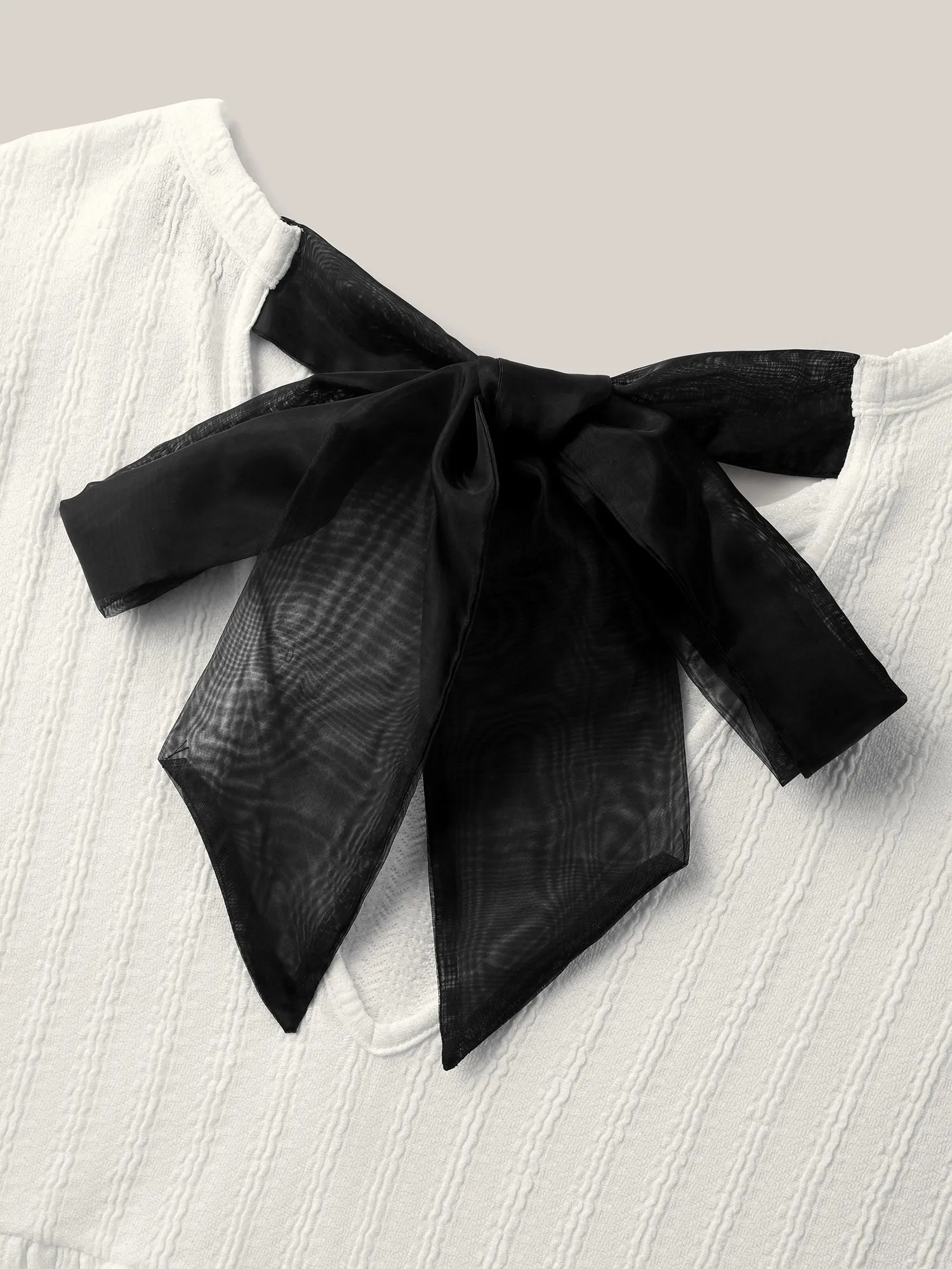 Backless Ribbon Tie Textured Top sold by Bloomchic product image thumbnail 5