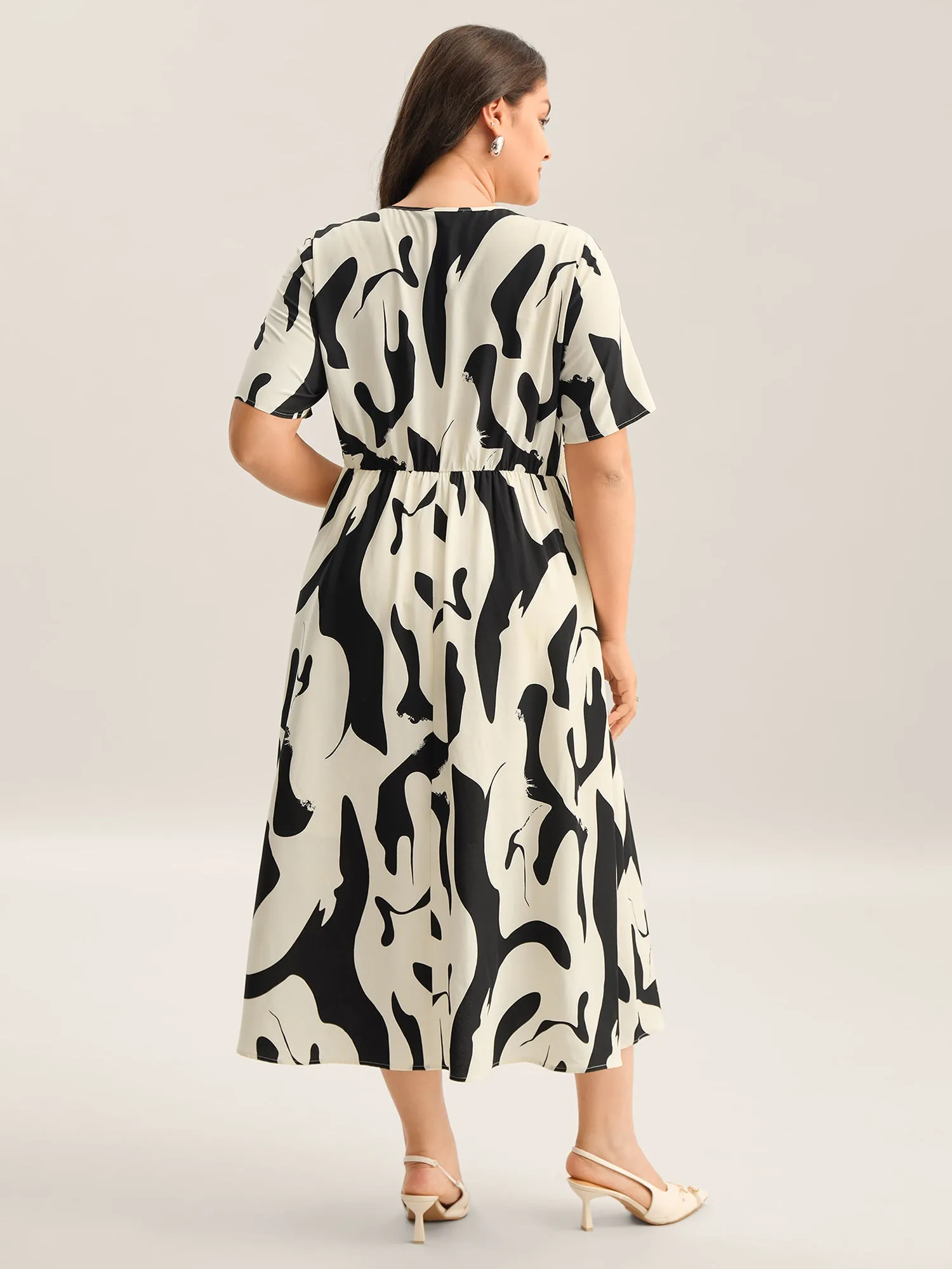 Geometric Print Surplice Neck Midi Dress sold by Bloomchic product image thumbnail 4