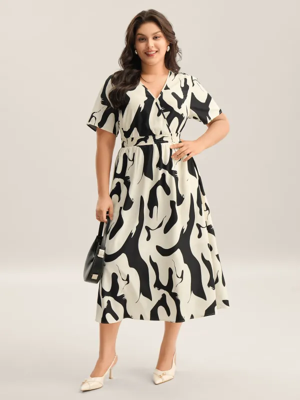 Geometric Print Surplice Neck Midi Dress sold by Bloomchic