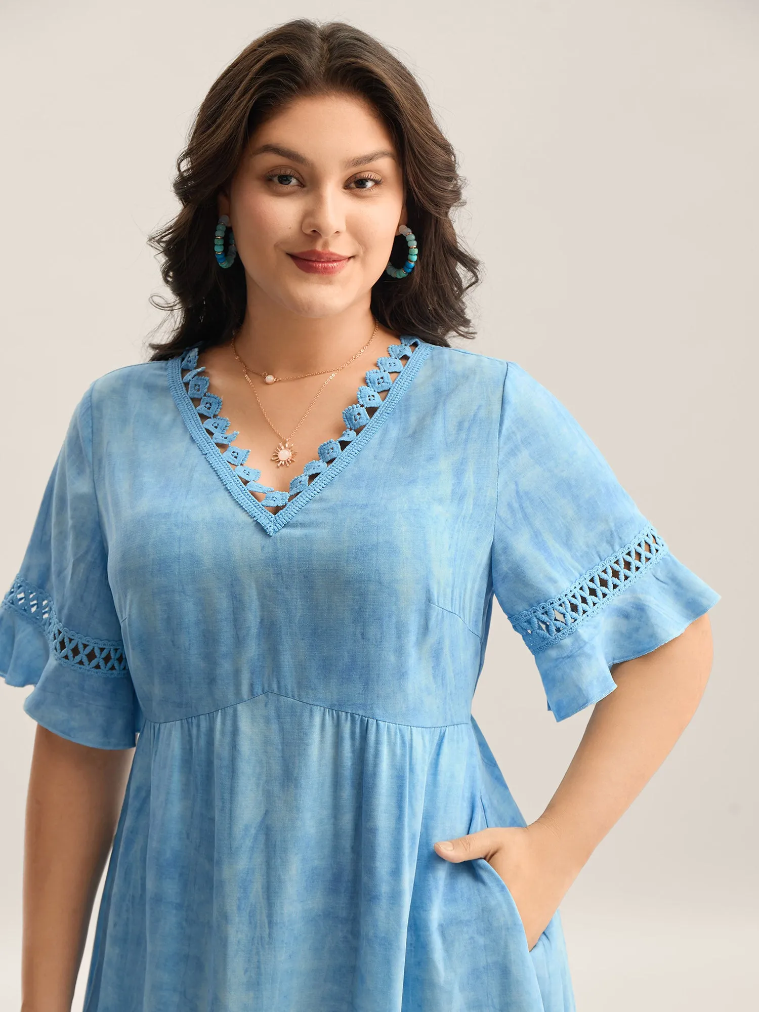 Color Blend Lace Trim Pockets Midi Dress sold by Bloomchic