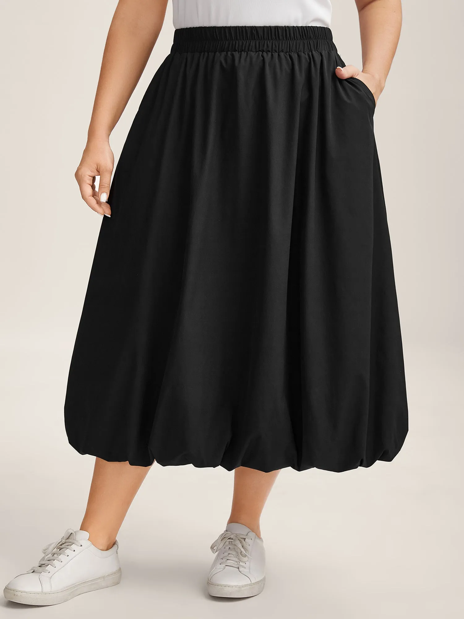 Bubble Hem Stretch Waist Midi Skirt sold by Bloomchic