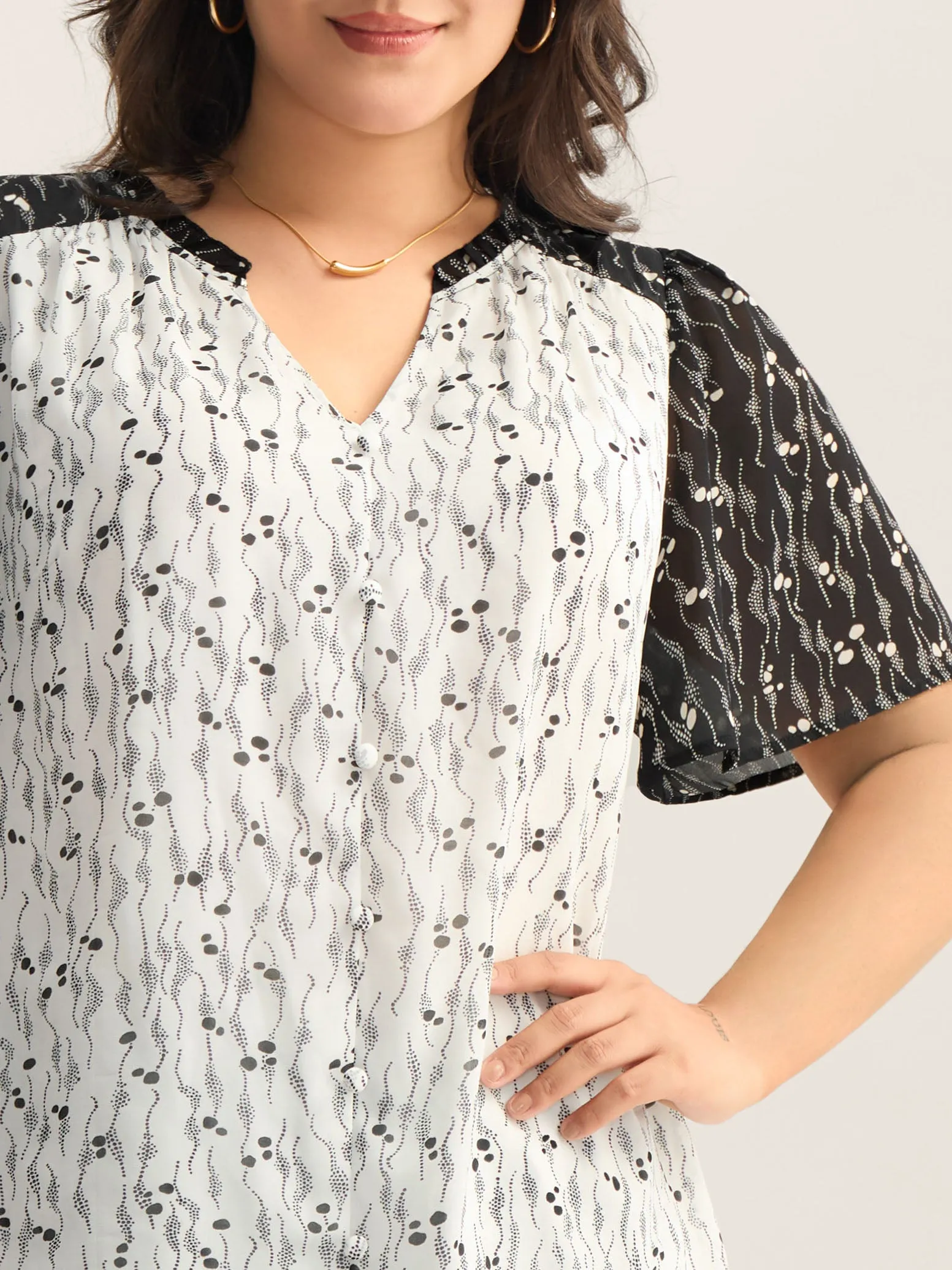 Color Contrast Notched Collar Spliced Blouse sold by Bloomchic