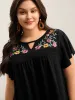 Floral Embroidered Neckline Flared Sleeve Top sold by Bloomchic