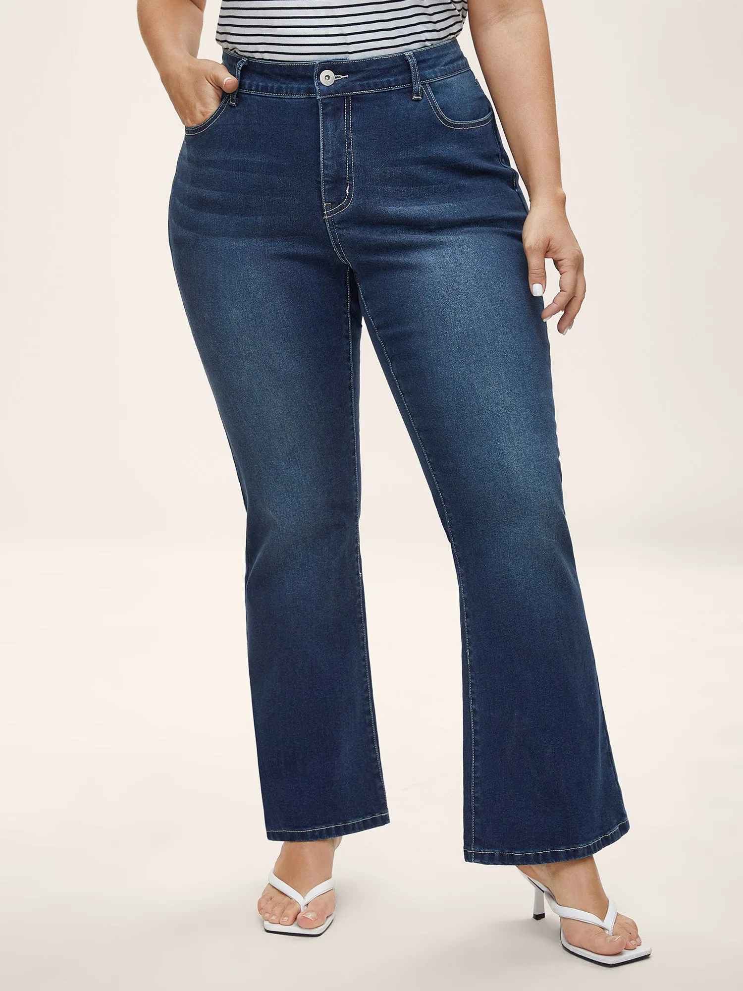 Slim & Sculpting Bootcut Jeans sold by Bloomchic