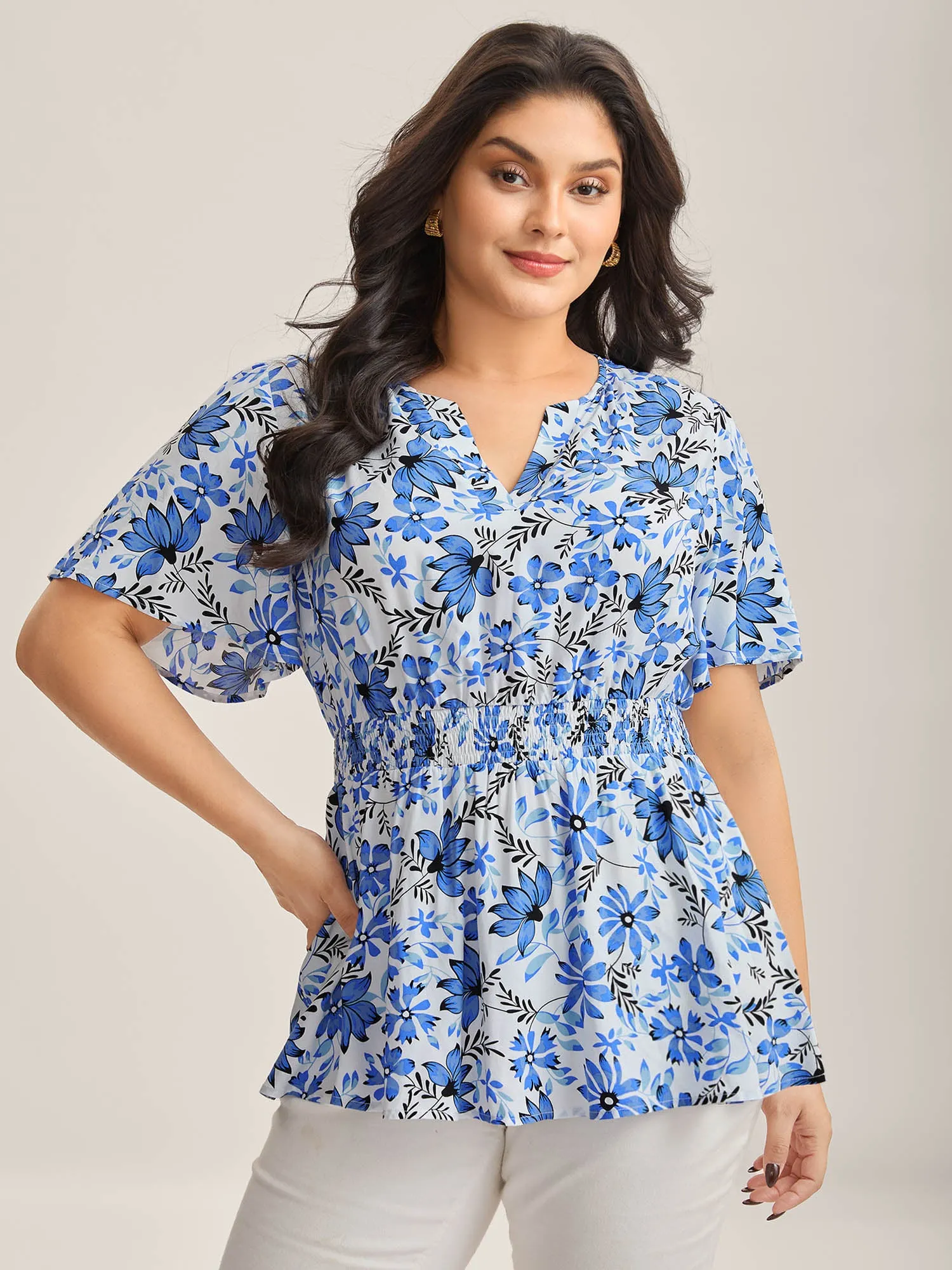 Floral Notched Collar Shirred Waist Blouse sold by Bloomchic