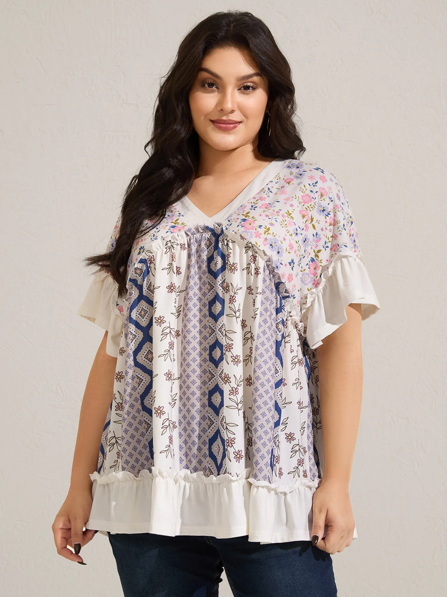 Floral Collage Print Knit Top sold by Bloomchic