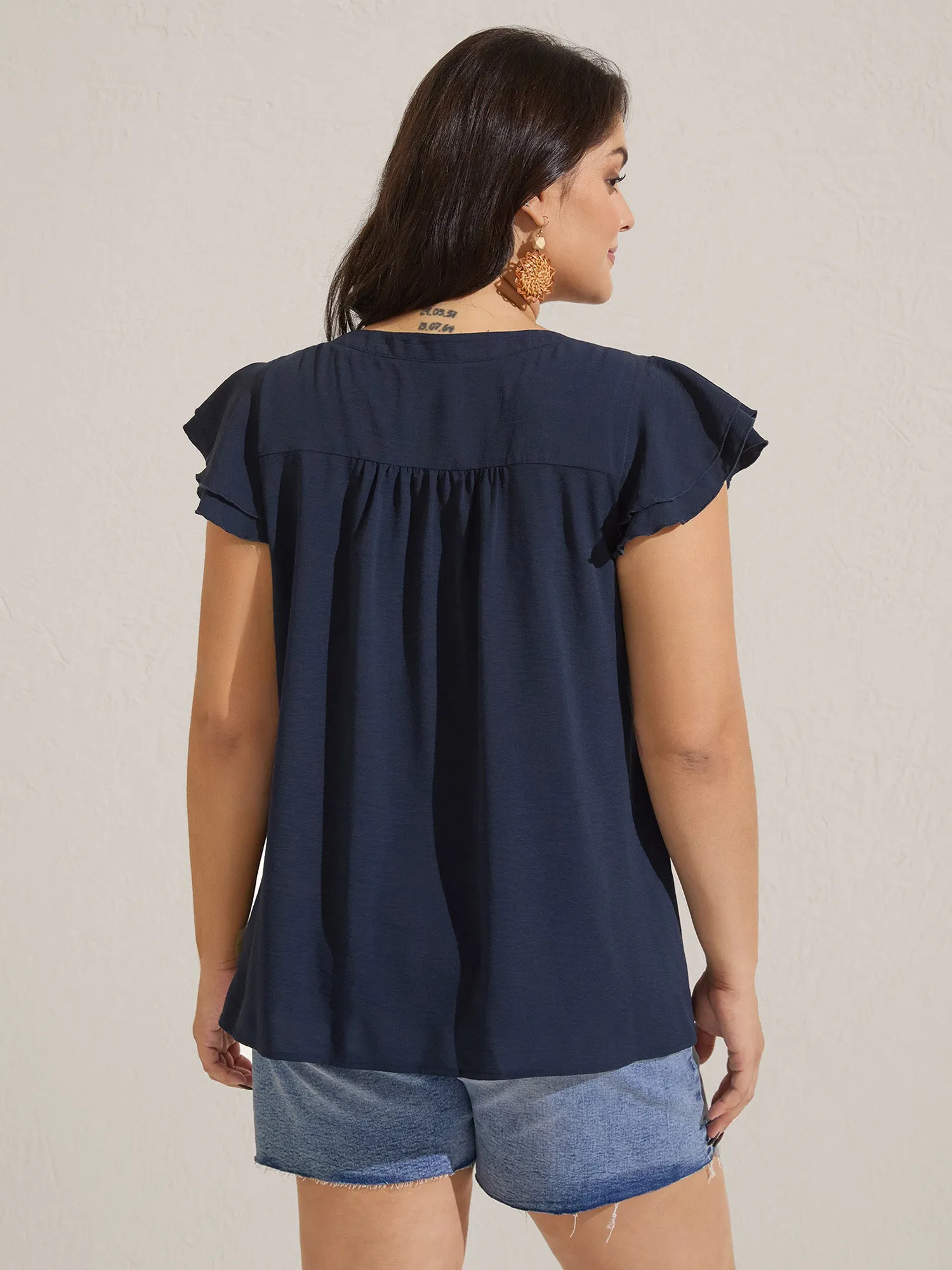 Solid Ruffle Trim Toothpick Pleat Blouse sold by Bloomchic product image thumbnail 4