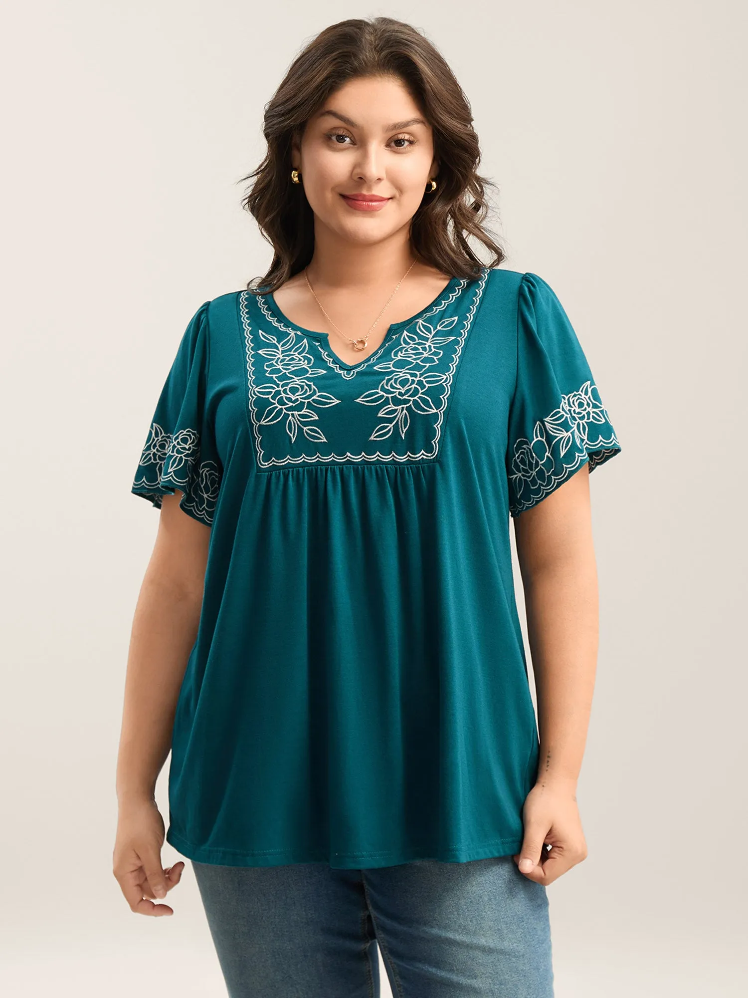 Floral Embroidery Split Neck Flowy Top sold by Bloomchic