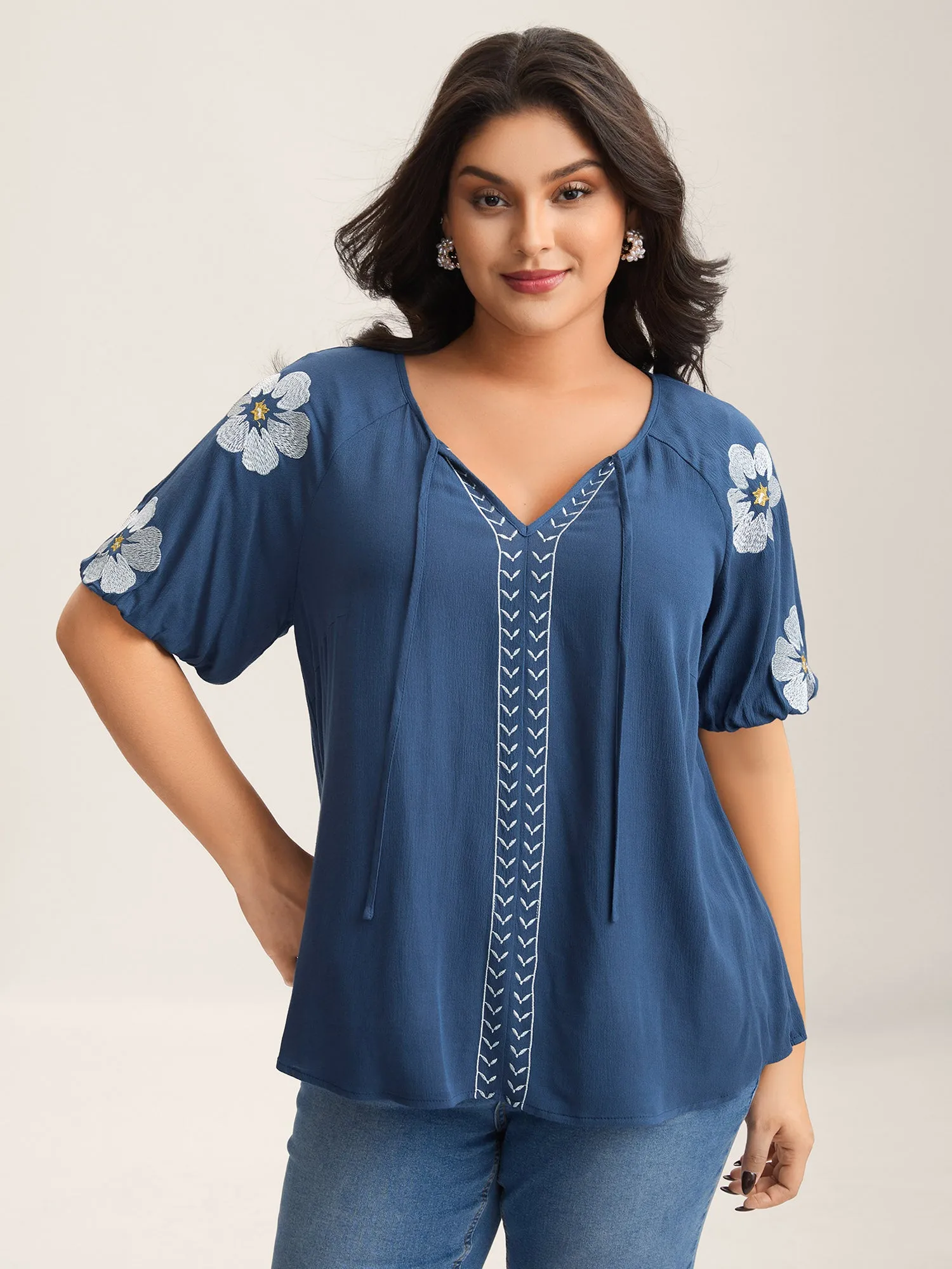 Floral Embroidery Textured Neck Tie Blouse sold by Bloomchic