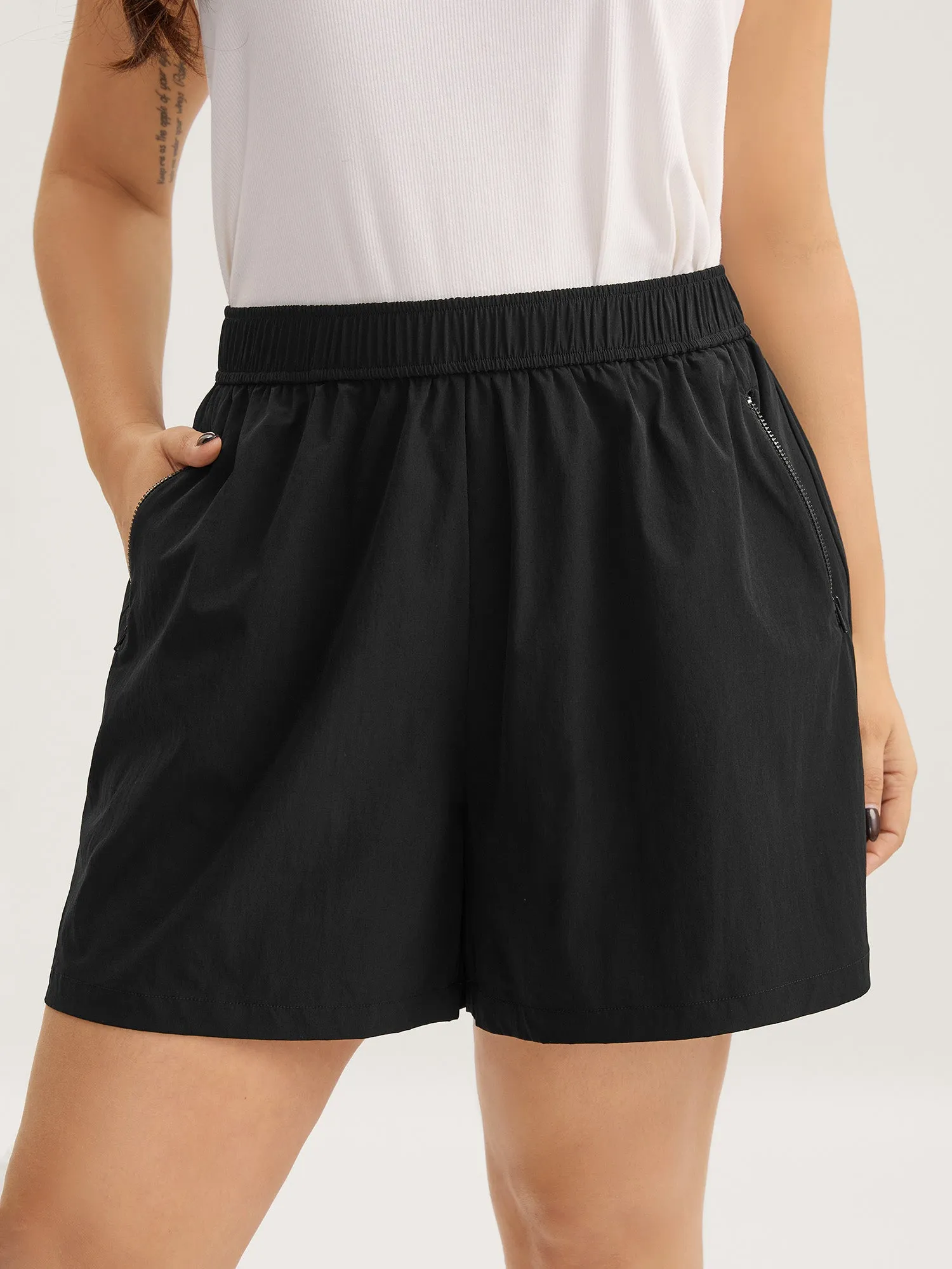 Solid Zipper Pockets Wide-Leg Shorts sold by Bloomchic
