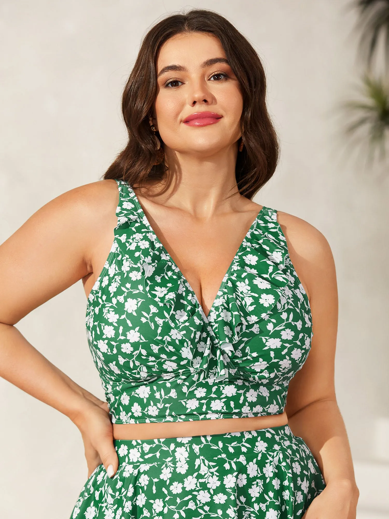 Ruffled Ditsy Floral Print Swim Top sold by Bloomchic